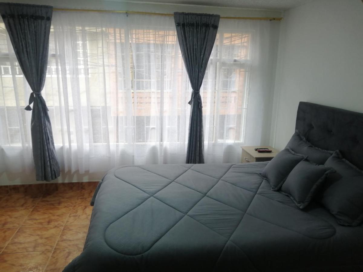 Habitación Privada Cerca al Aeropuerto y Terminal