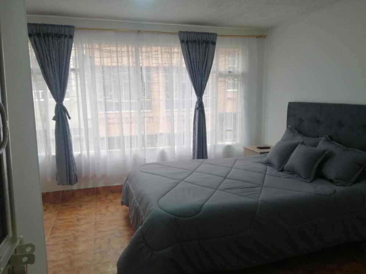 Habitación Privada Cerca al Aeropuerto y Terminal