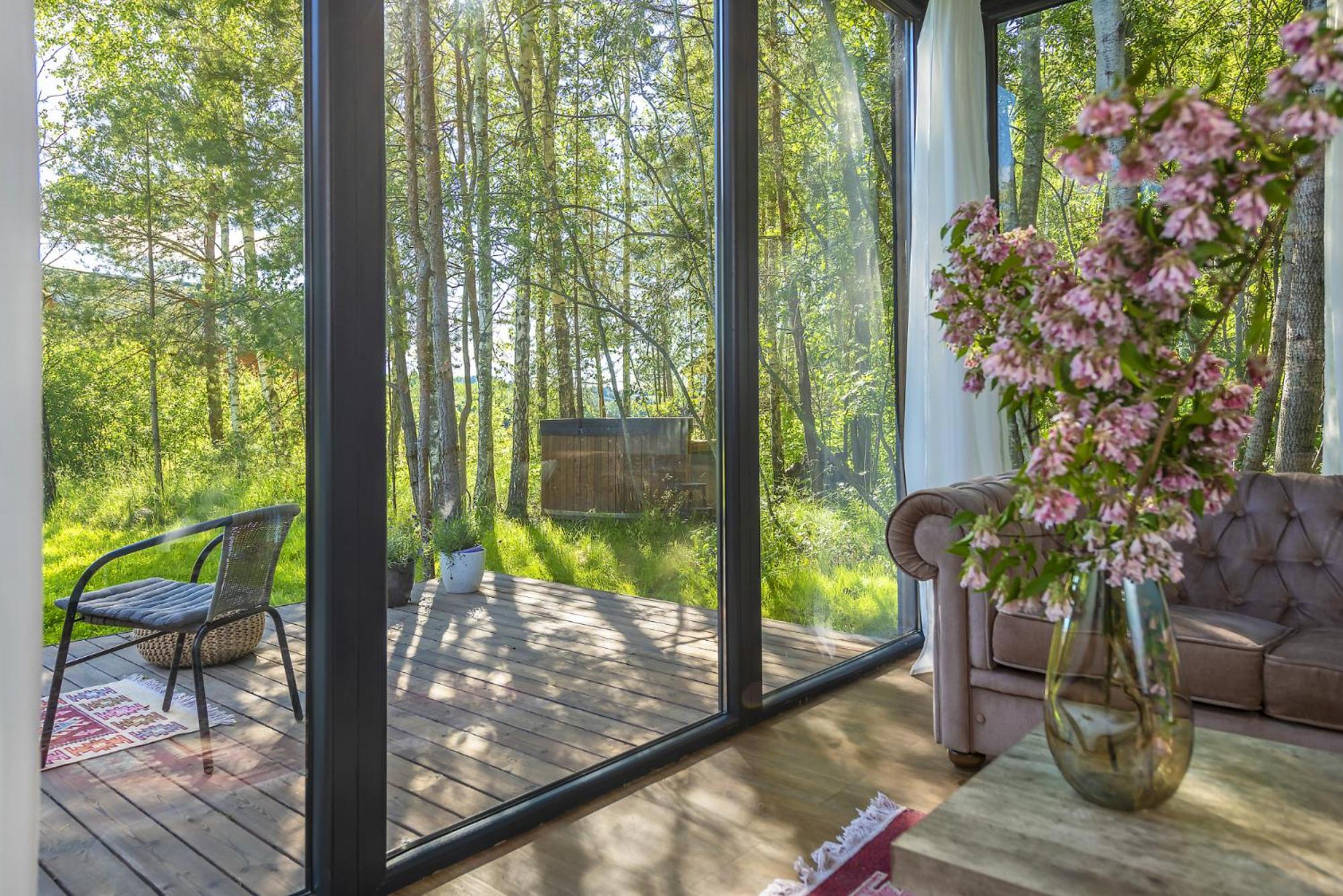 Modern and specious riverside cabin with hot tub view 2