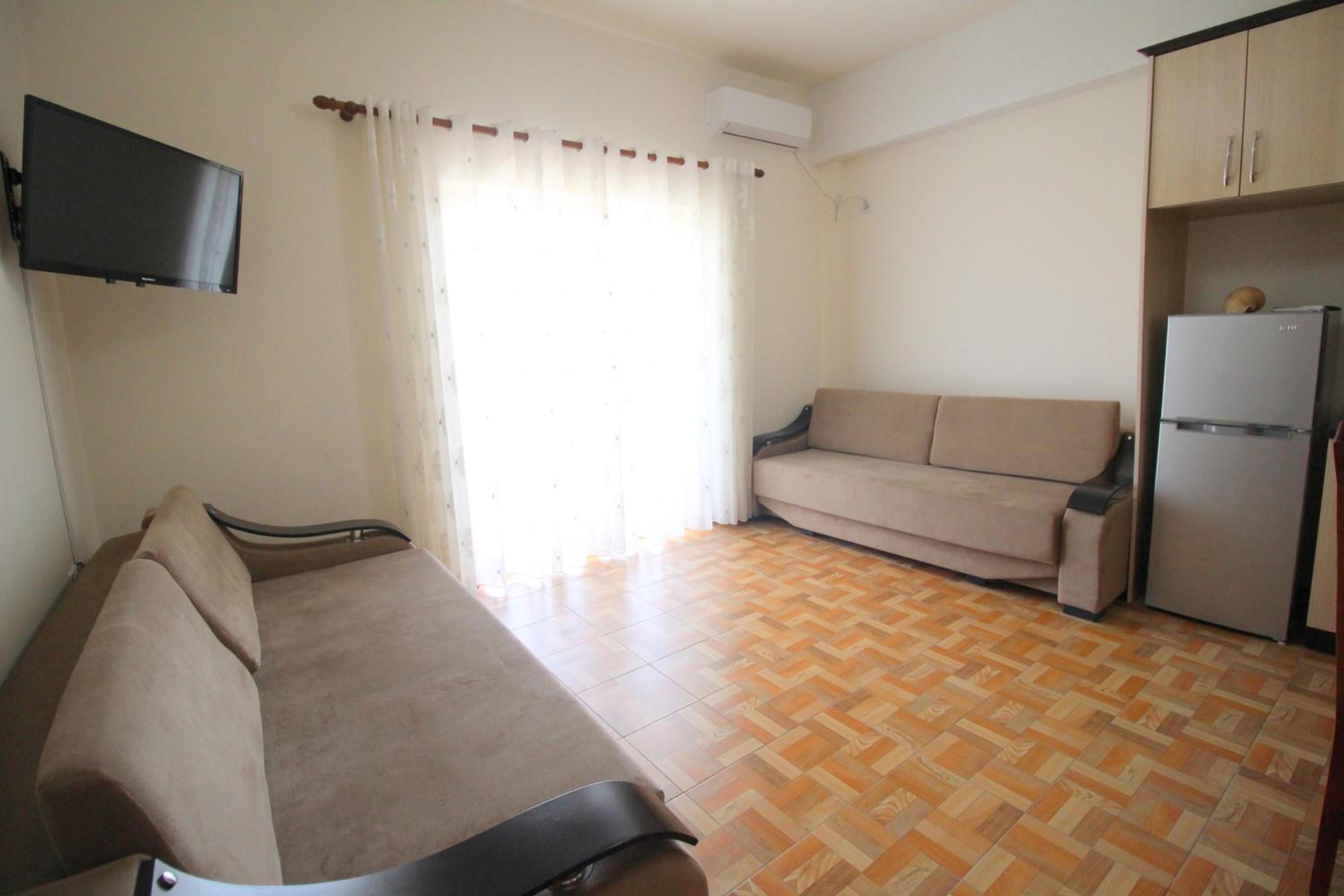 Doka Center Apartments