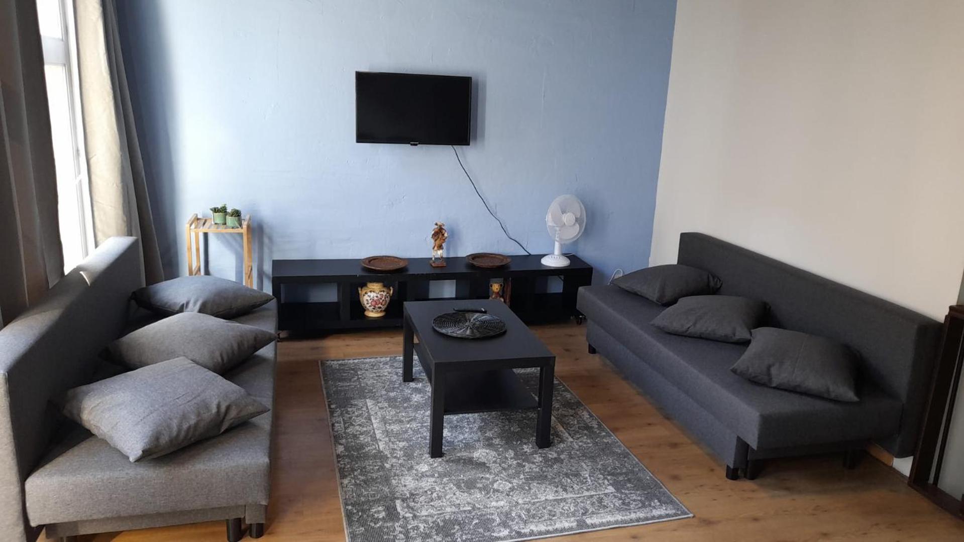 Blue apartment in the old town view 3