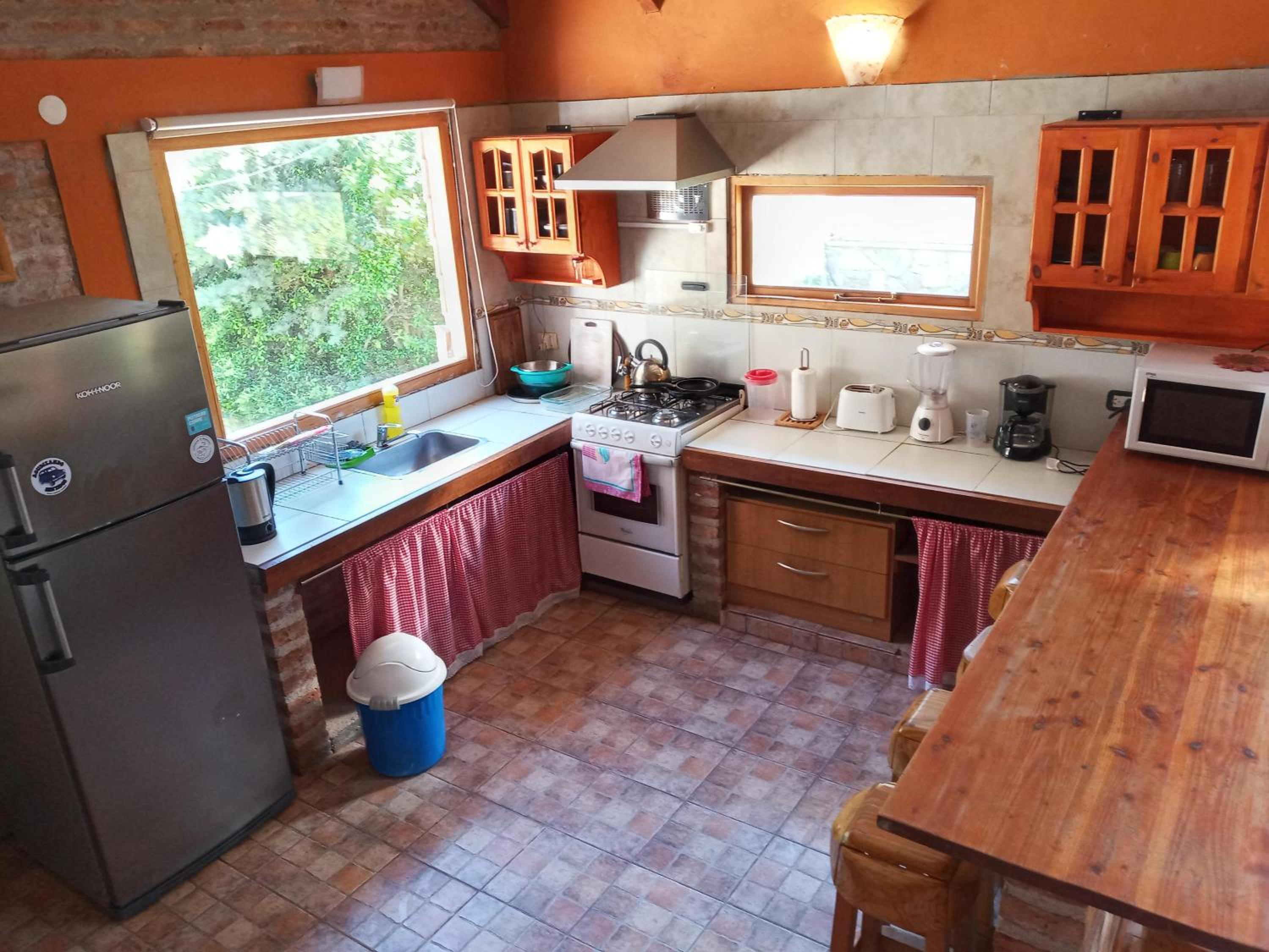 Cabaña con costa de arroyo