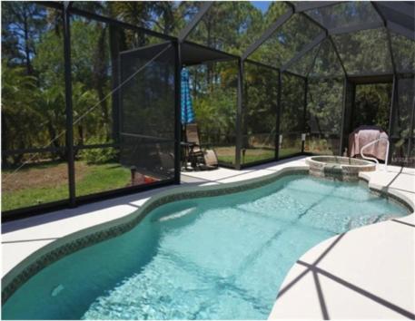 Punta Gorda Vacations - Paradise - 3 Bedroom Private Villa with Heated Pool - Property Image 1
