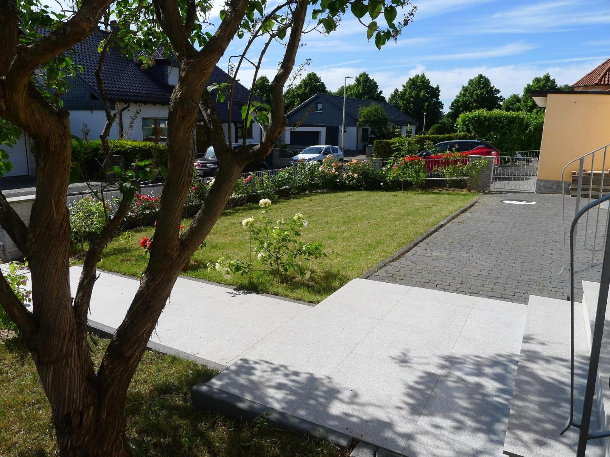 Ferienwohnung mit Terrasse am Rosengarten