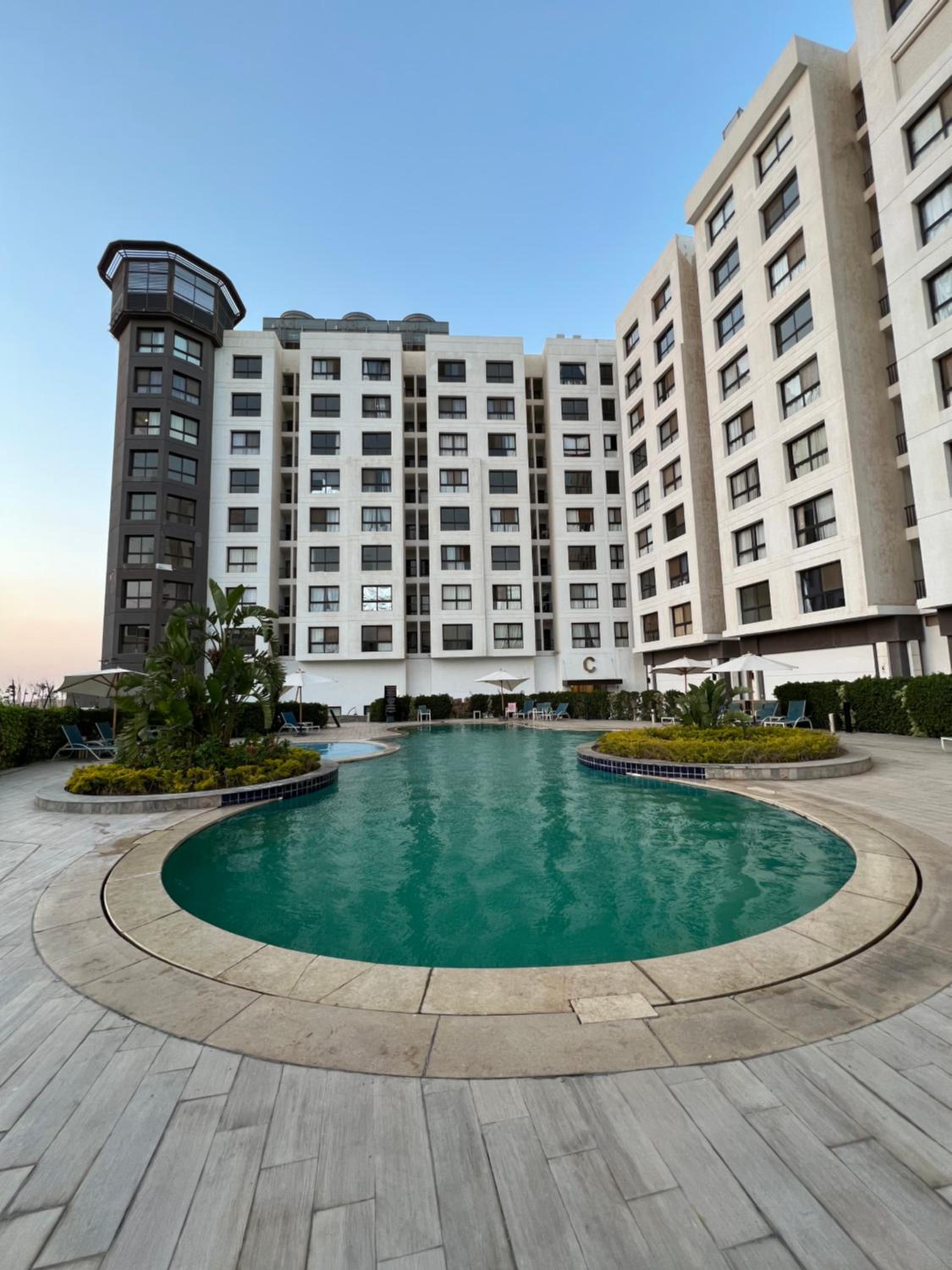 Luxury hotel apartment with pools in front AUC