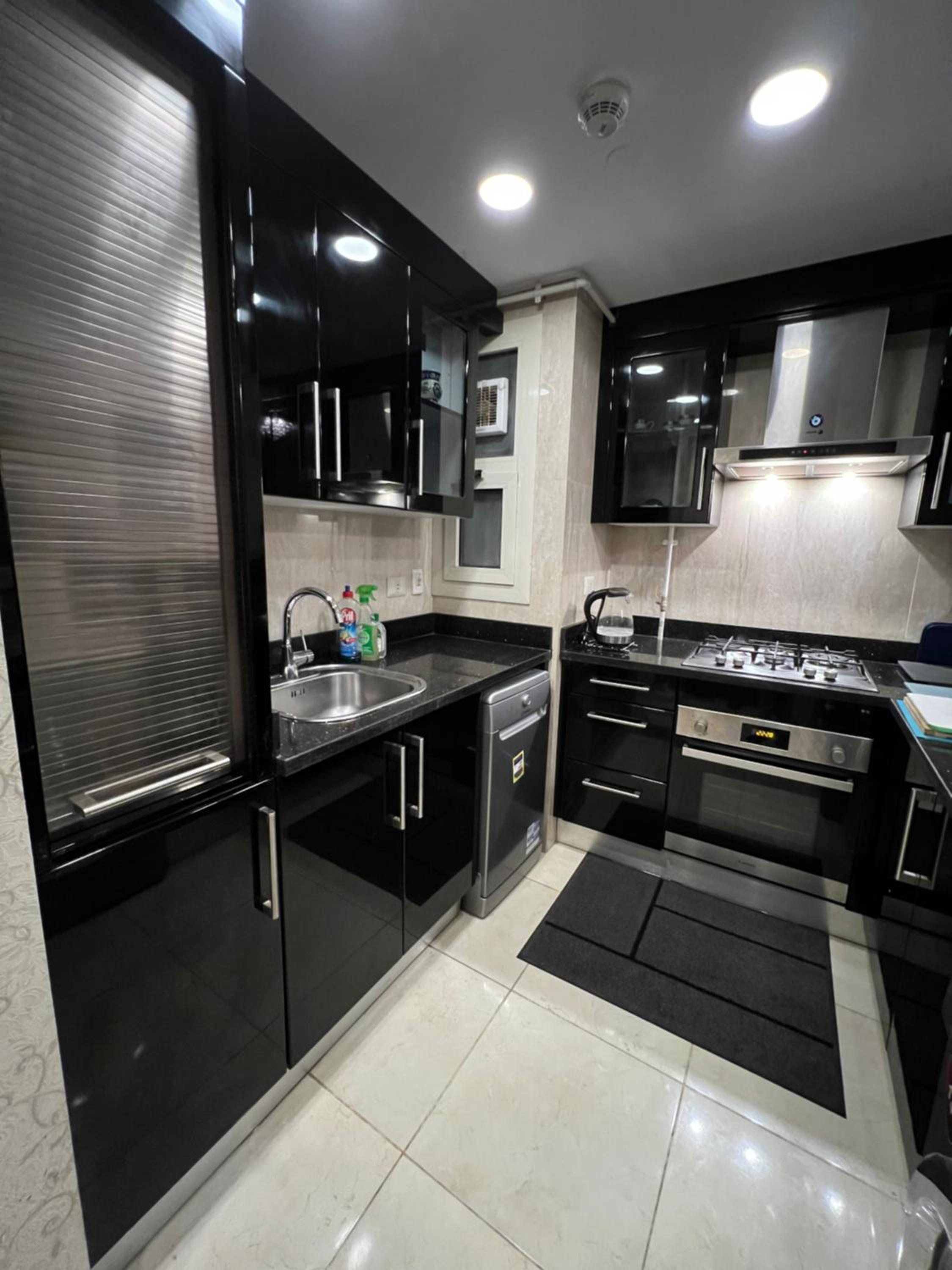 Luxury hotel apartment with pools in front AUC