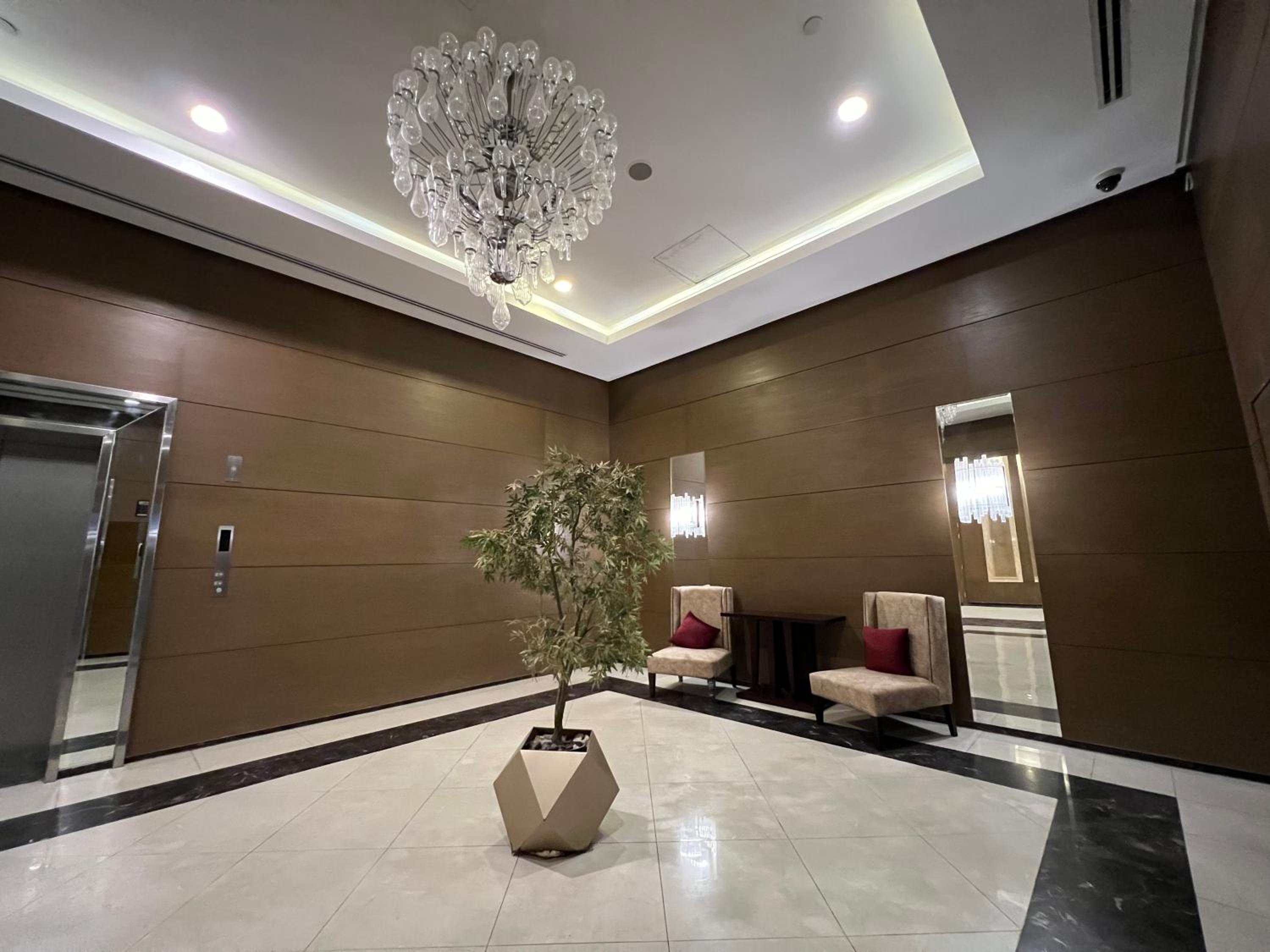Luxury hotel apartment with pools in front AUC