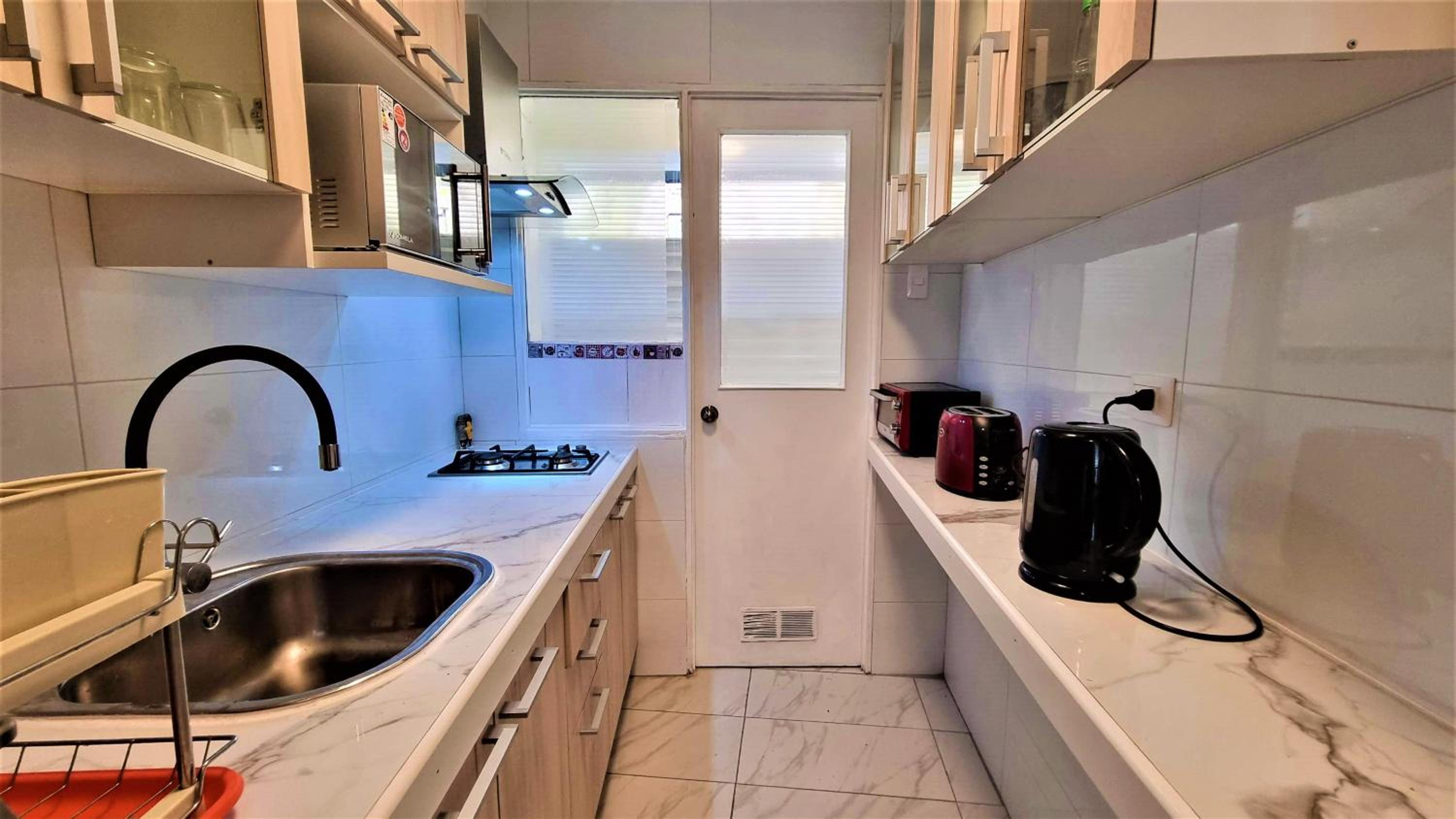Familiar y renovado departamento a pasos de playa