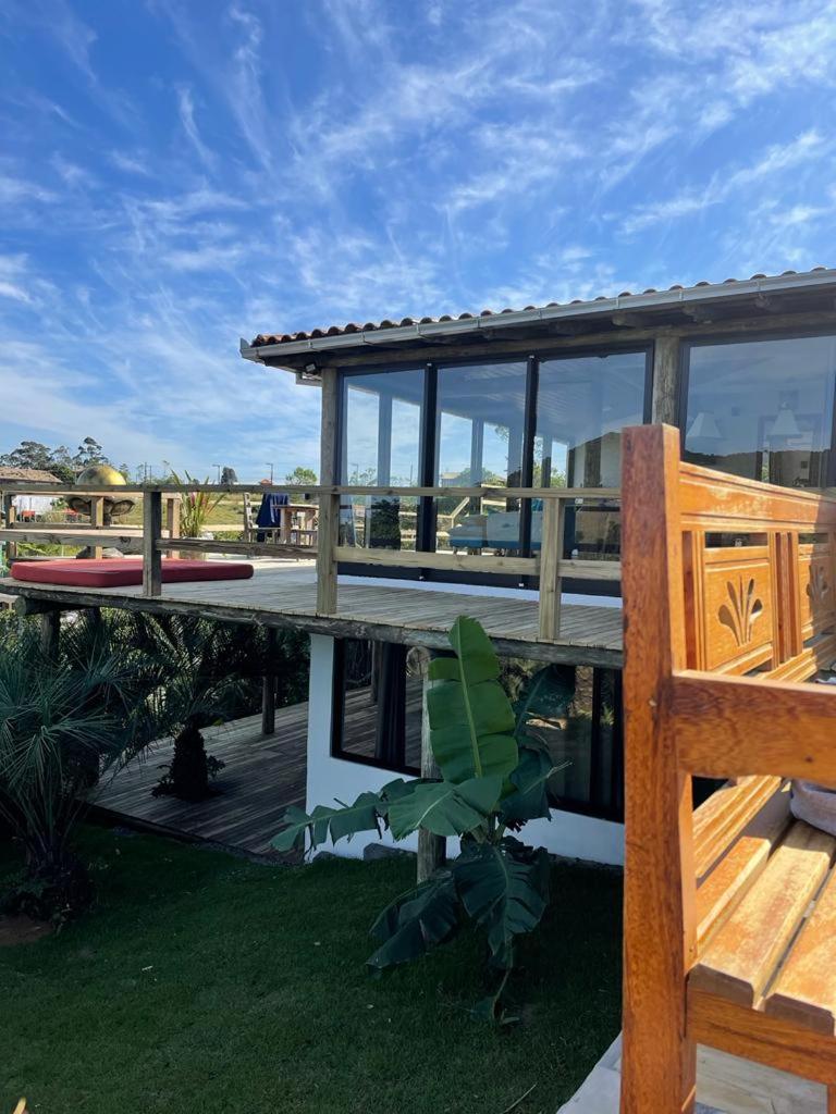 Villa Santorini Praia do Rosa com piscina e jacuzzi