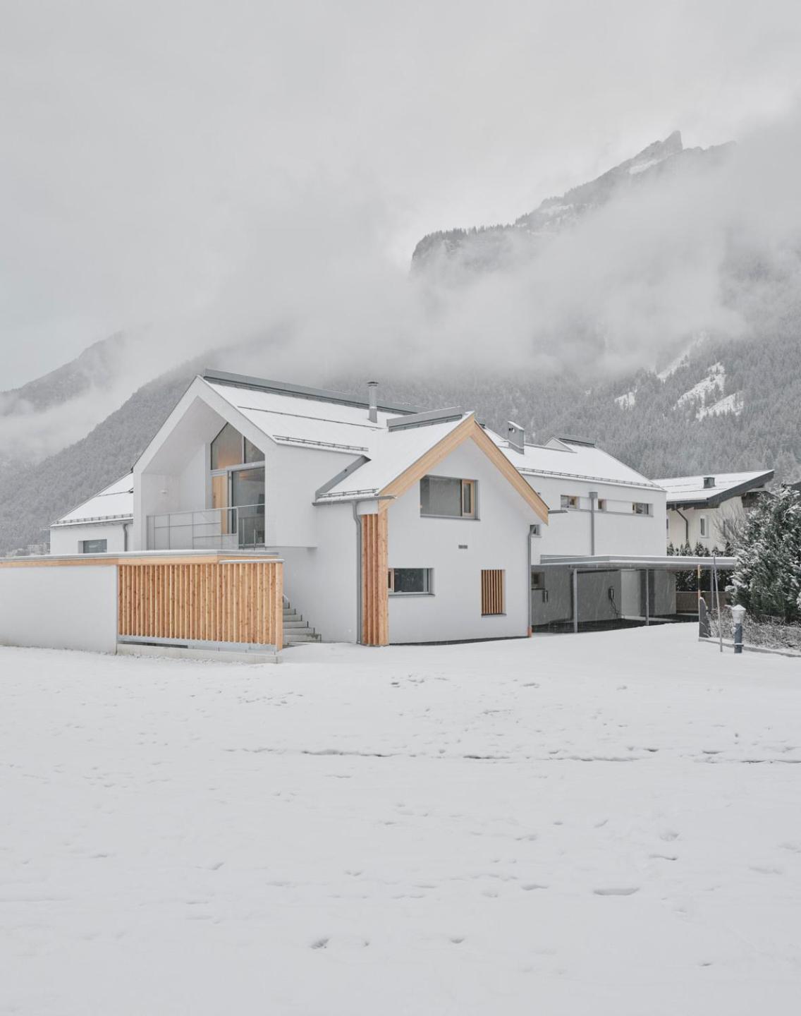 Modern Alpine Penthouse with Lake View