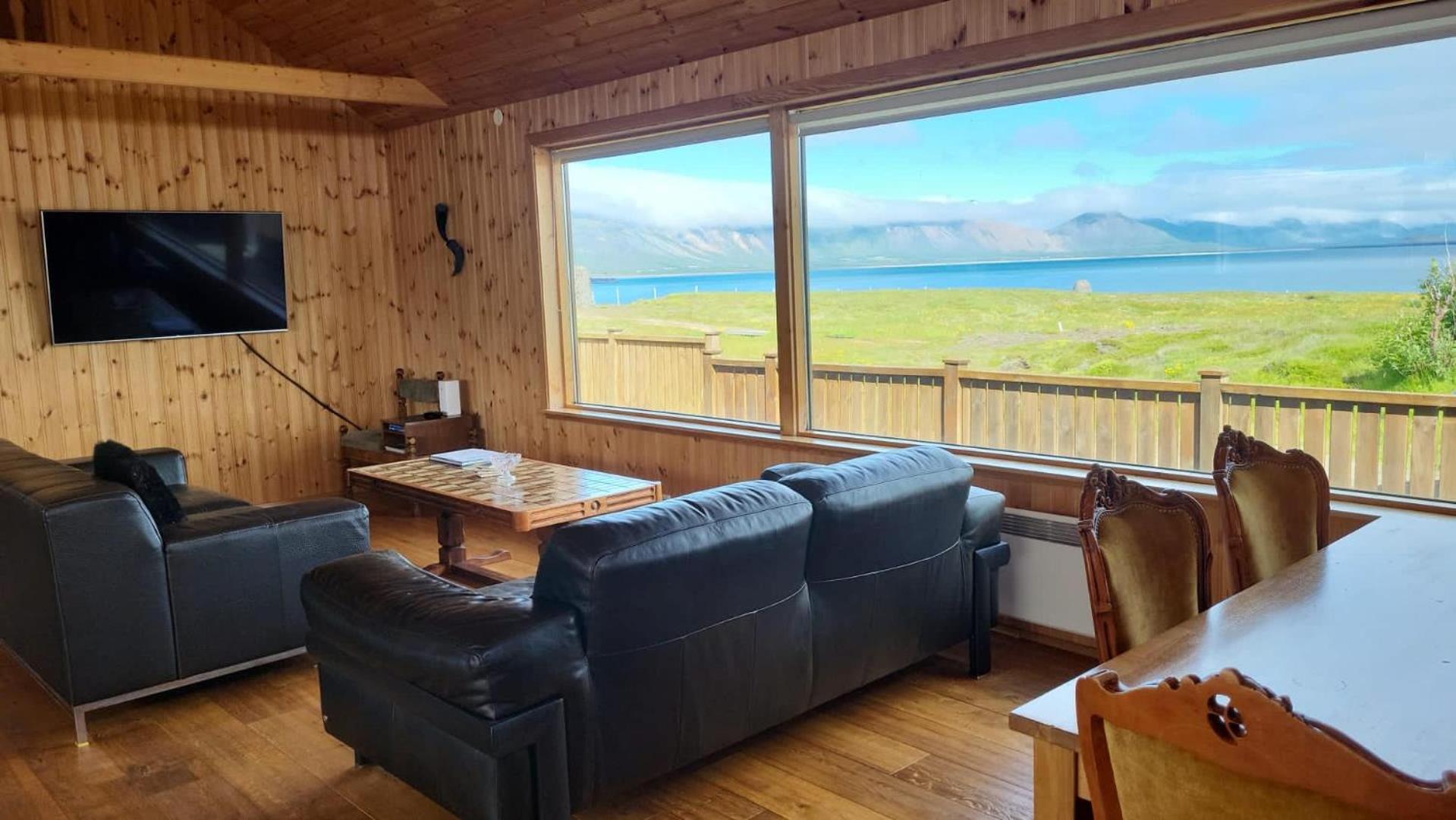 Glass House with Private River & 360° Views view 3