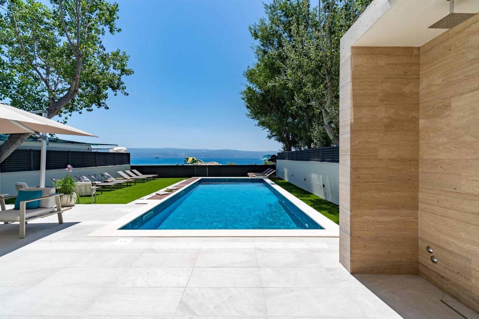 Beachfront Villa Erce with private 40sqm heated pool, a Gym, 7 en-suite bedrooms, a rooftop terrace, 2 living areas view 5