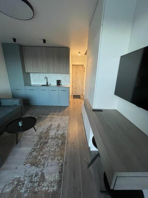 SUNNY studio w balcony and heated pool in Mano Jūra 2