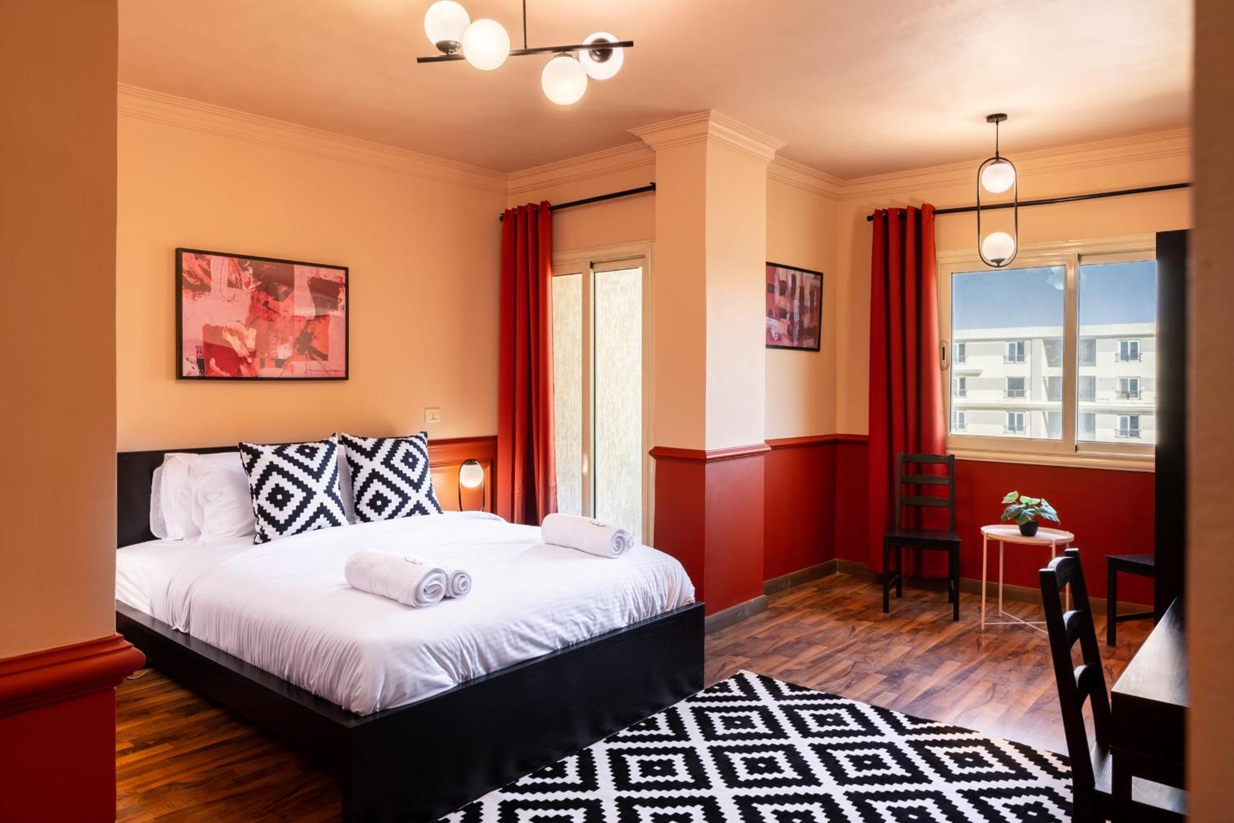 Distinct & Decent 2 BDR Apt Steps From Nightlife and Airport