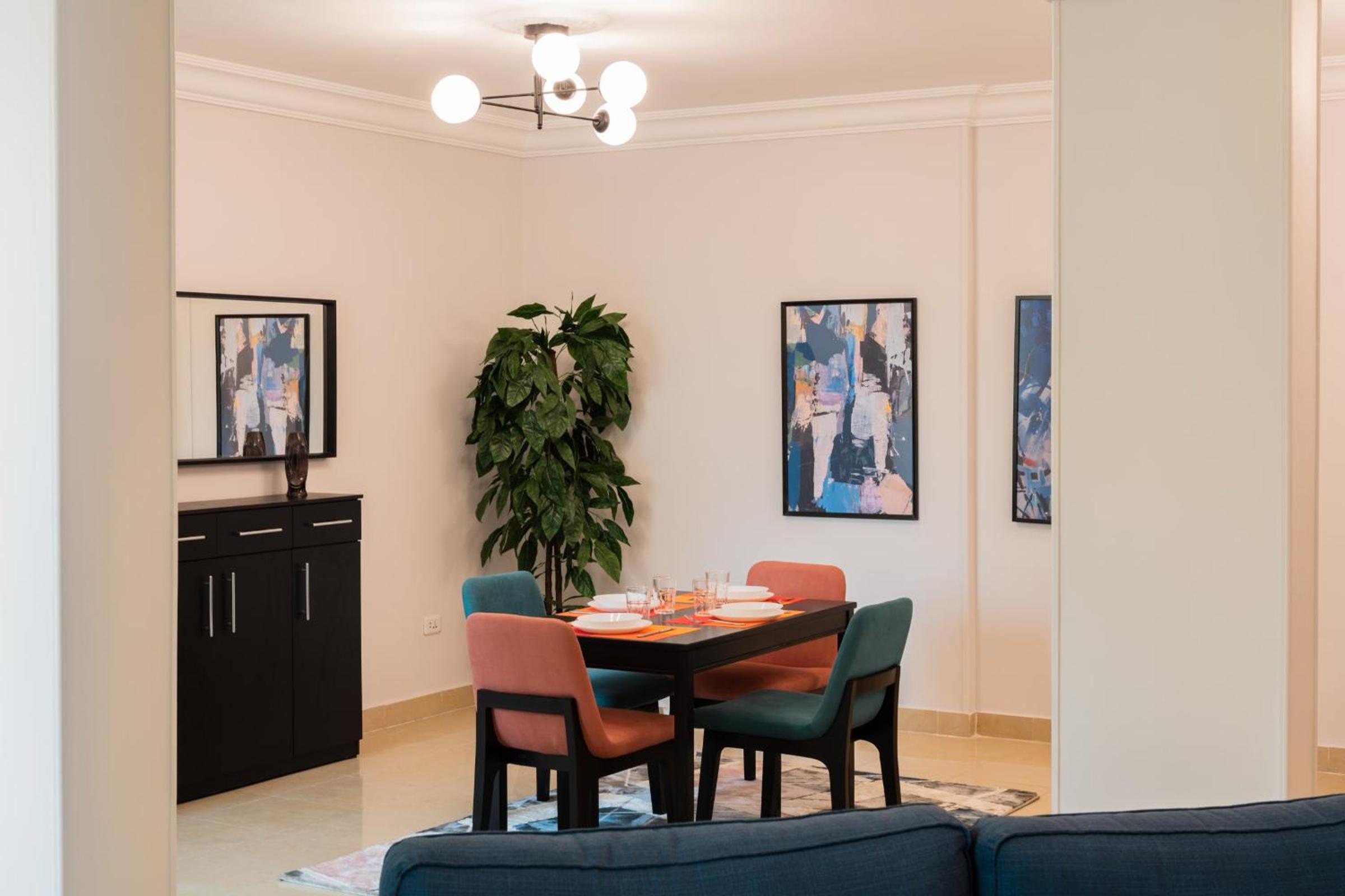 Distinct & Decent 2 BDR Apt Steps From Nightlife and Airport