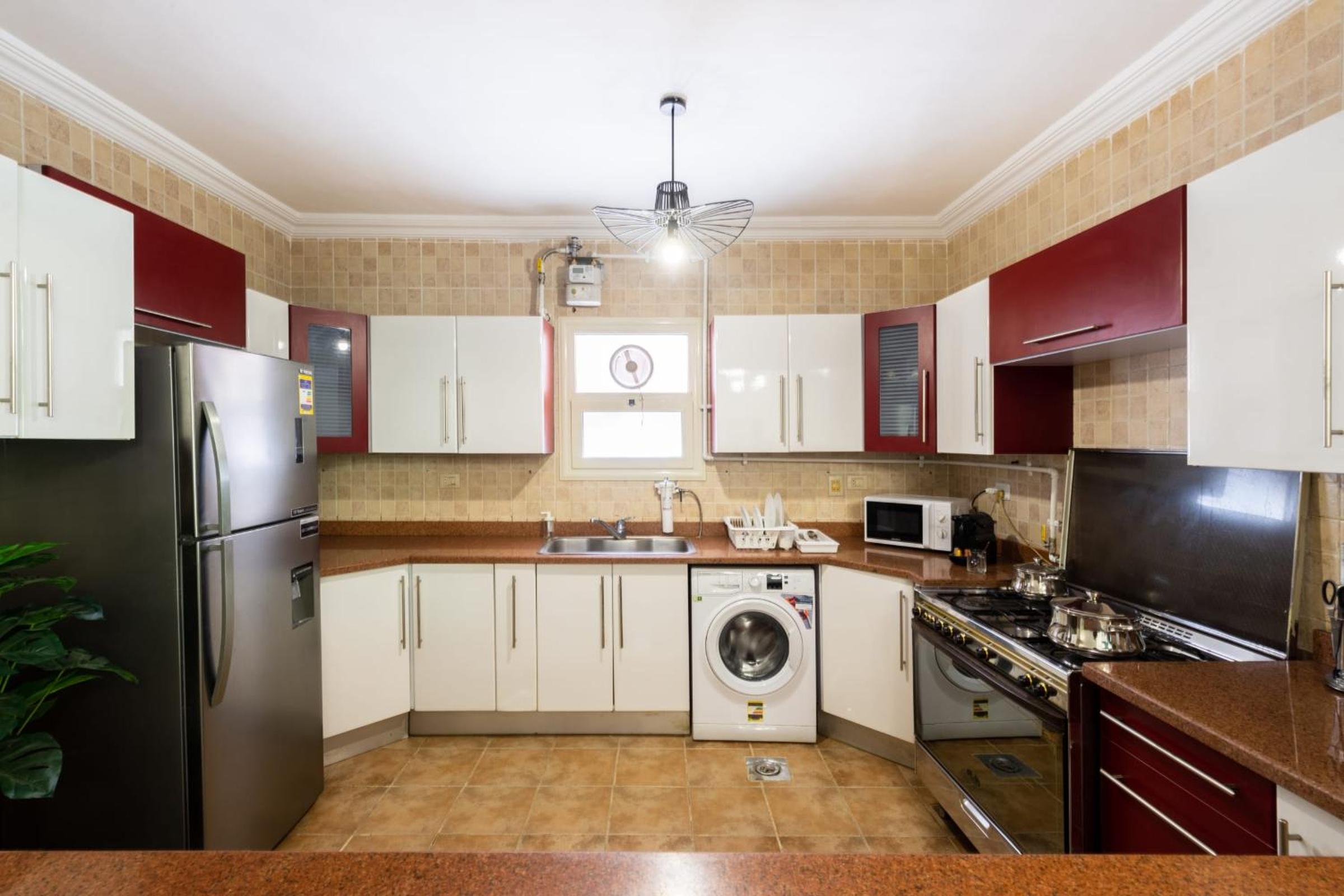 Distinct & Decent 2 BDR Apt Steps From Nightlife and Airport
