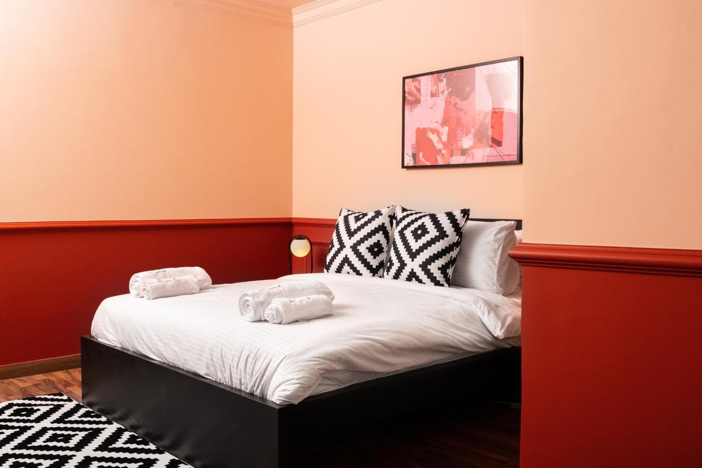Distinct & Decent 2 BDR Apt Steps From Nightlife and Airport