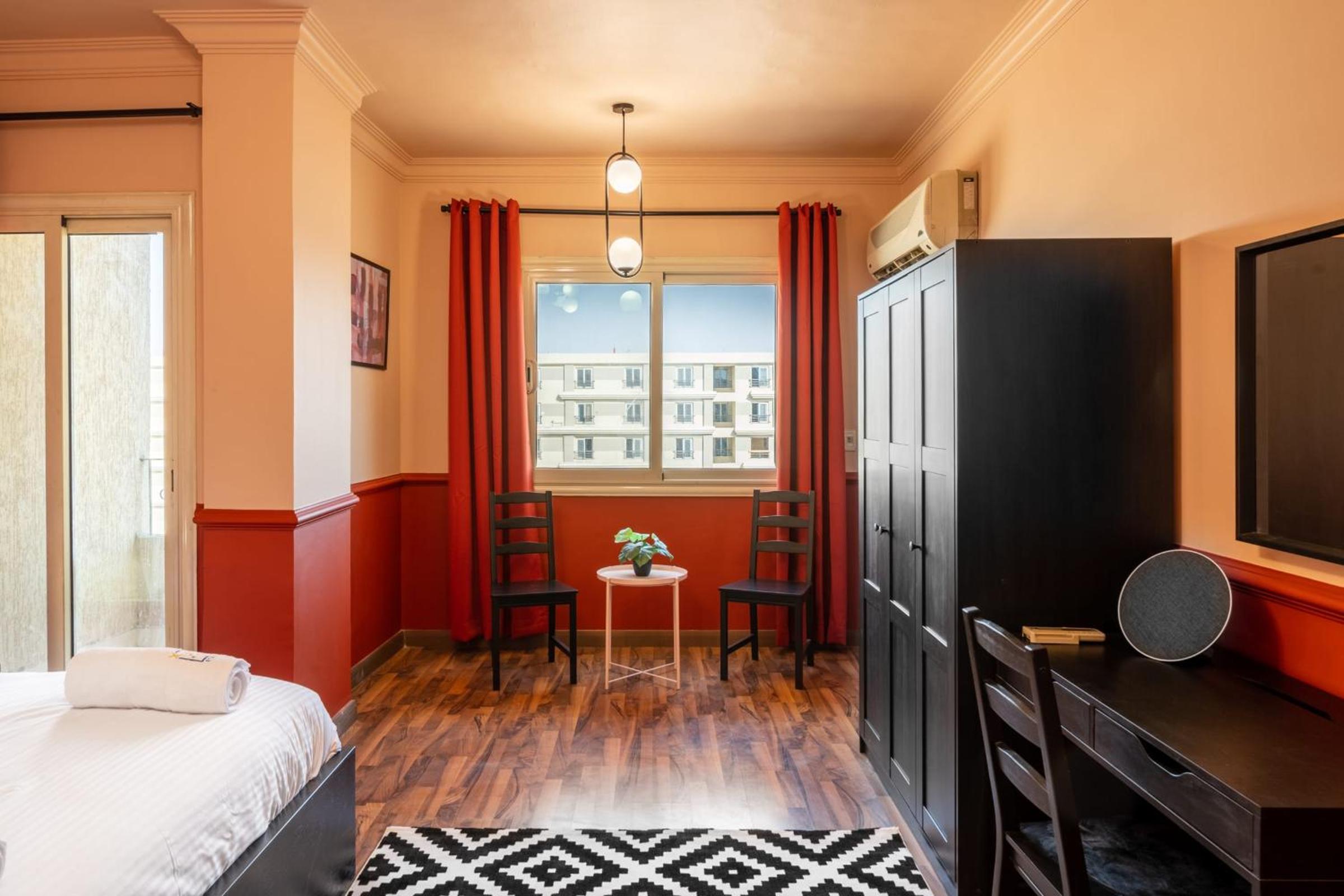 Distinct & Decent 2 BDR Apt Steps From Nightlife and Airport