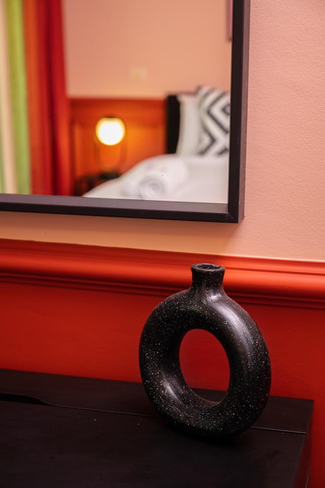 Distinct & Decent 2 BDR Apt Steps From Nightlife and Airport