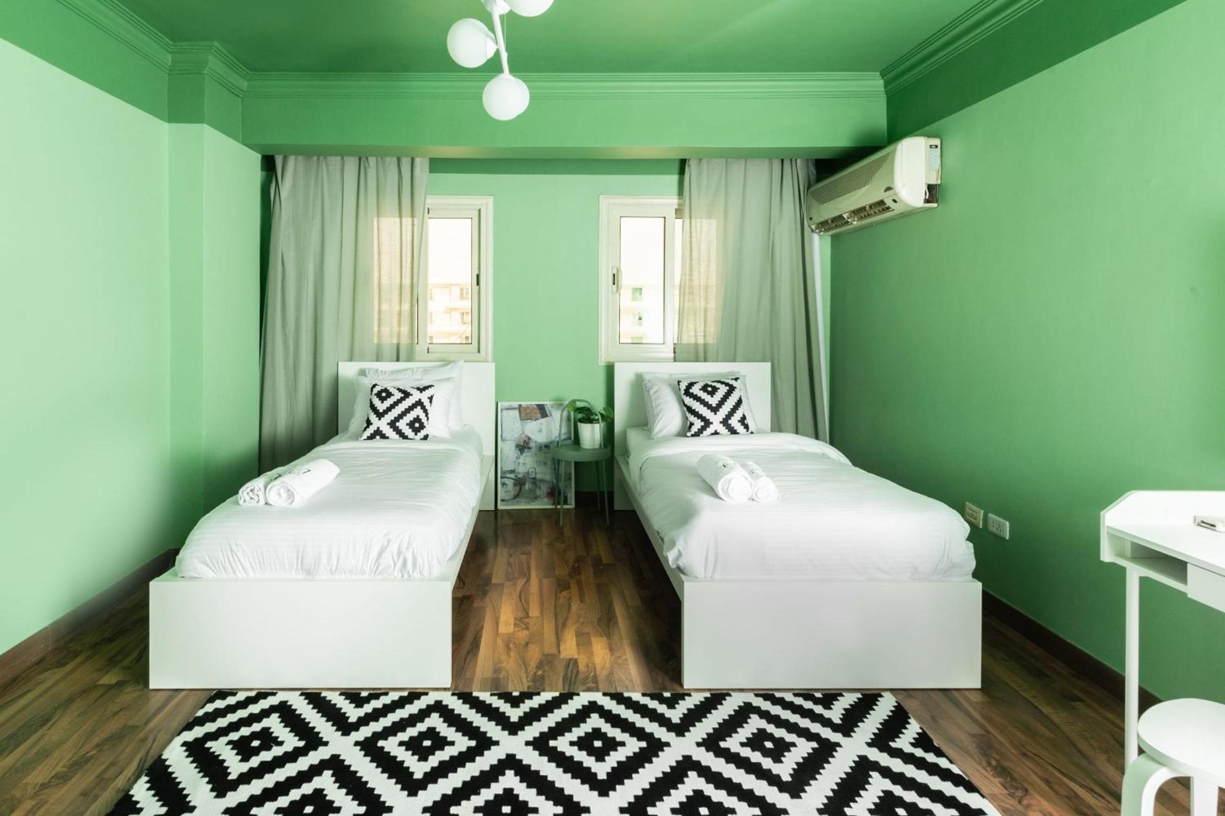 Distinct & Decent 2 BDR Apt Steps From Nightlife and Airport