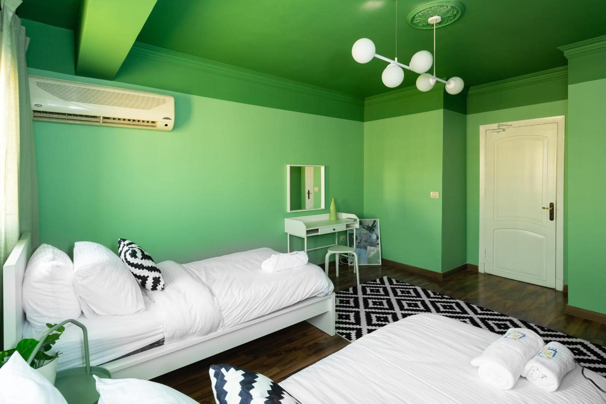 Distinct & Decent 2 BDR Apt Steps From Nightlife and Airport