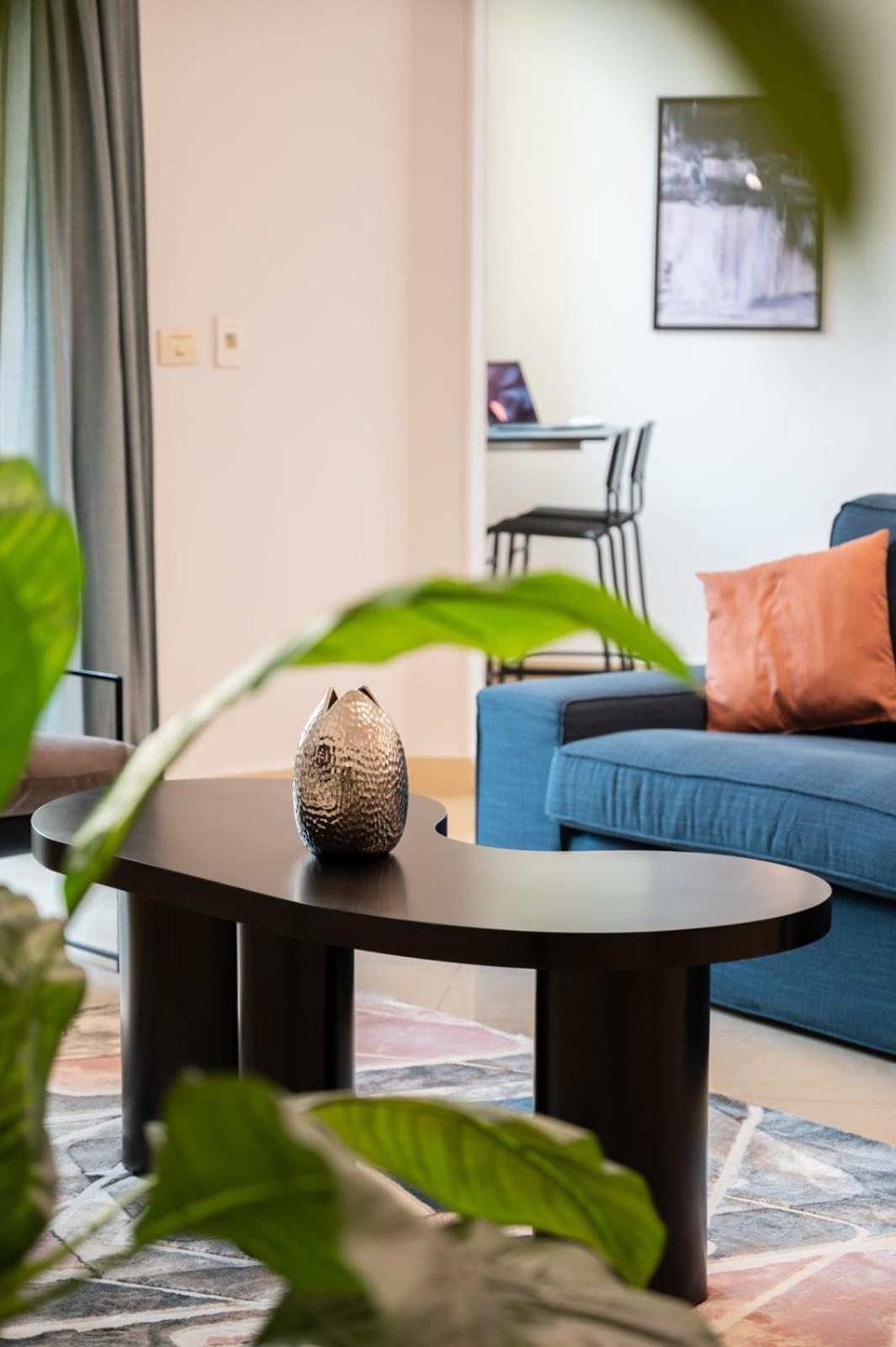 Distinct & Decent 2 BDR Apt Steps From Nightlife and Airport