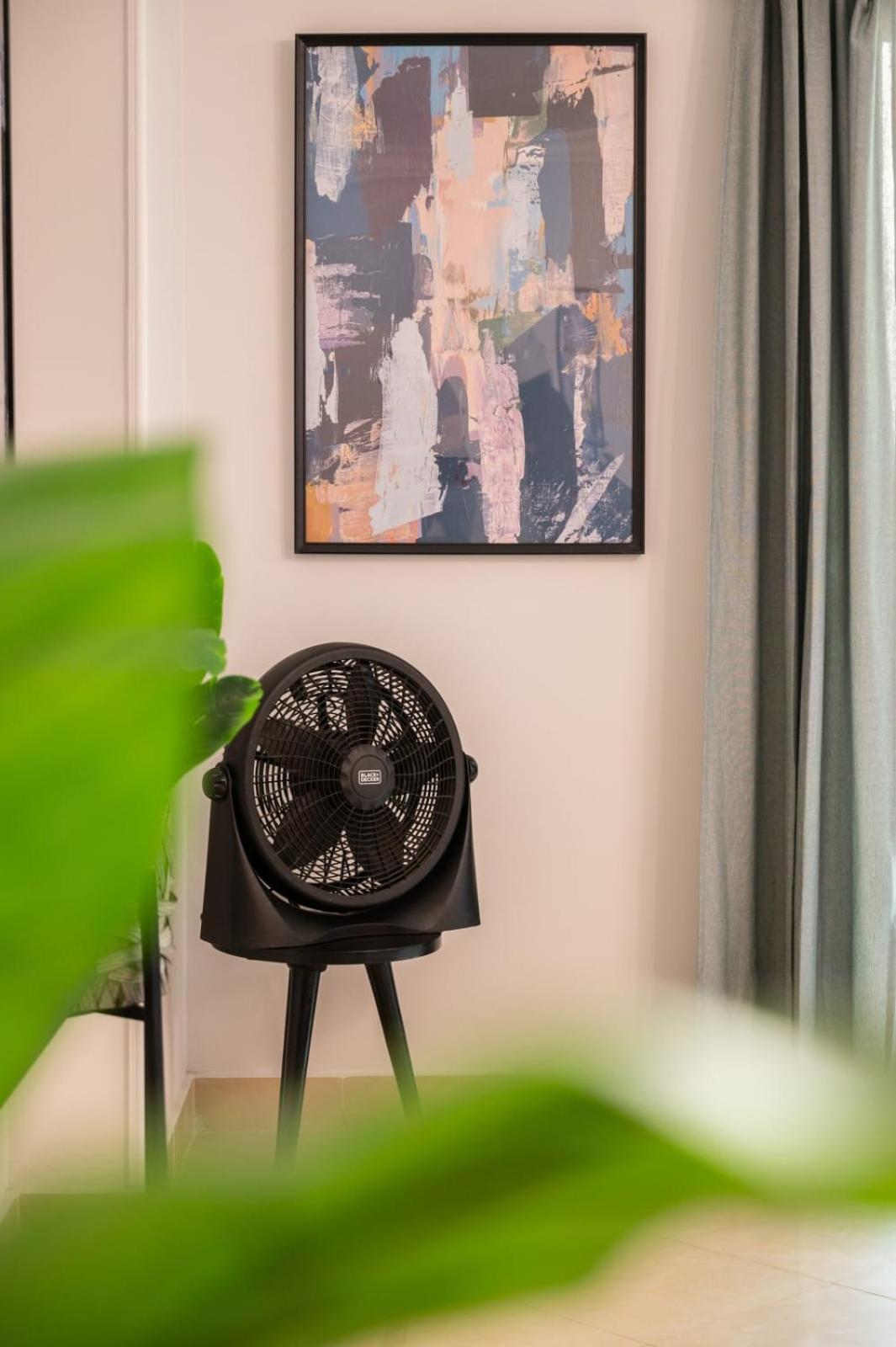Distinct & Decent 2 BDR Apt Steps From Nightlife and Airport