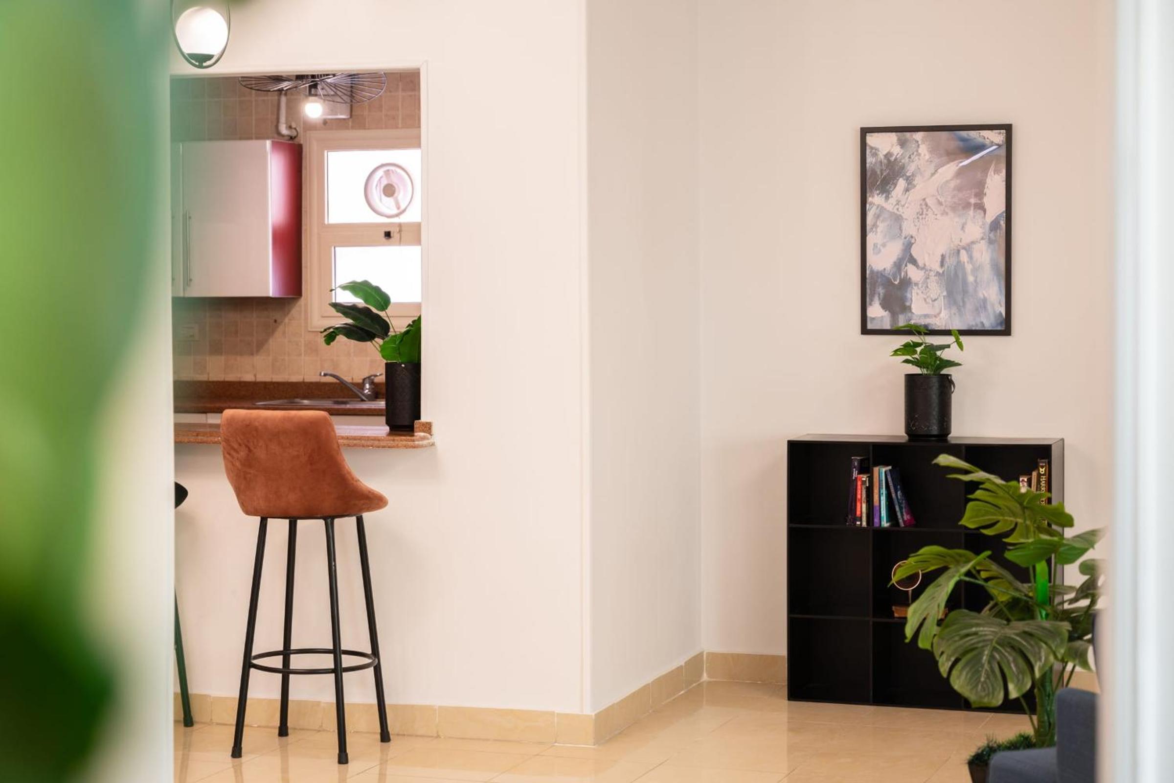 Distinct & Decent 2 BDR Apt Steps From Nightlife and Airport