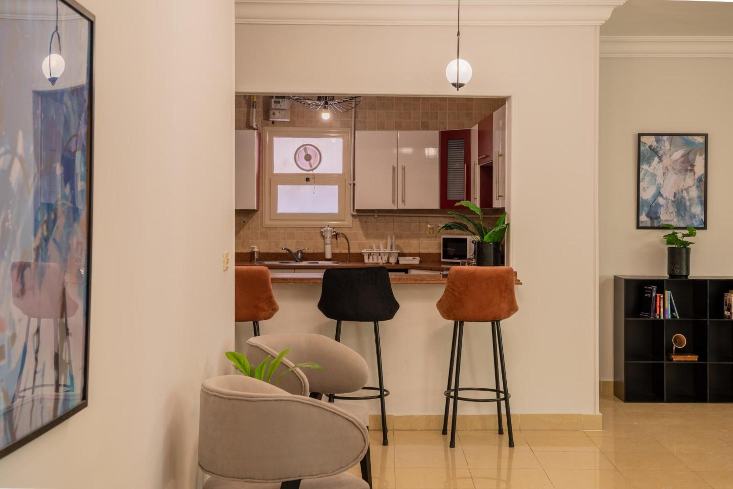 Distinct & Decent 2 BDR Apt Steps From Nightlife and Airport