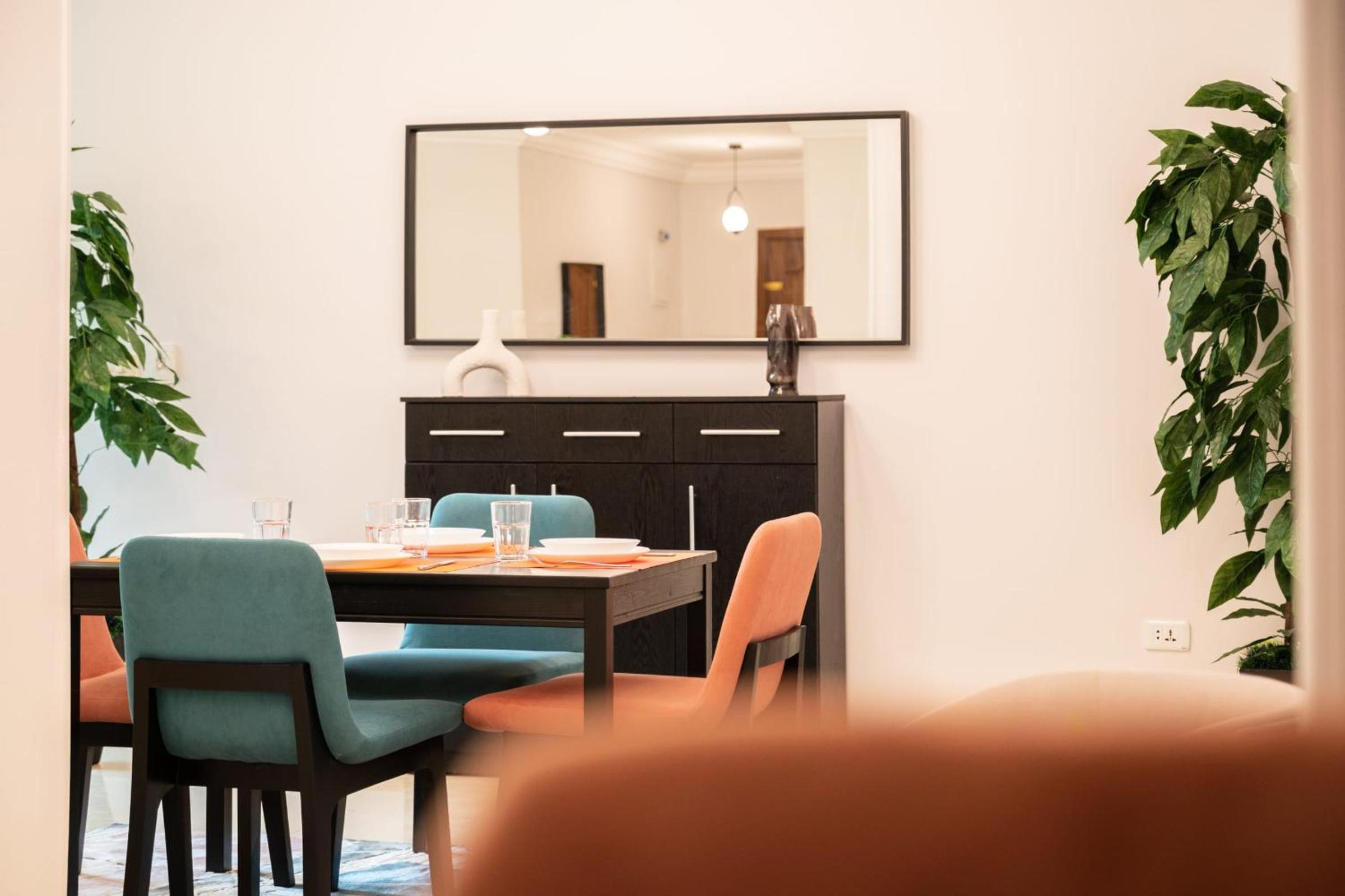 Distinct & Decent 2 BDR Apt Steps From Nightlife and Airport