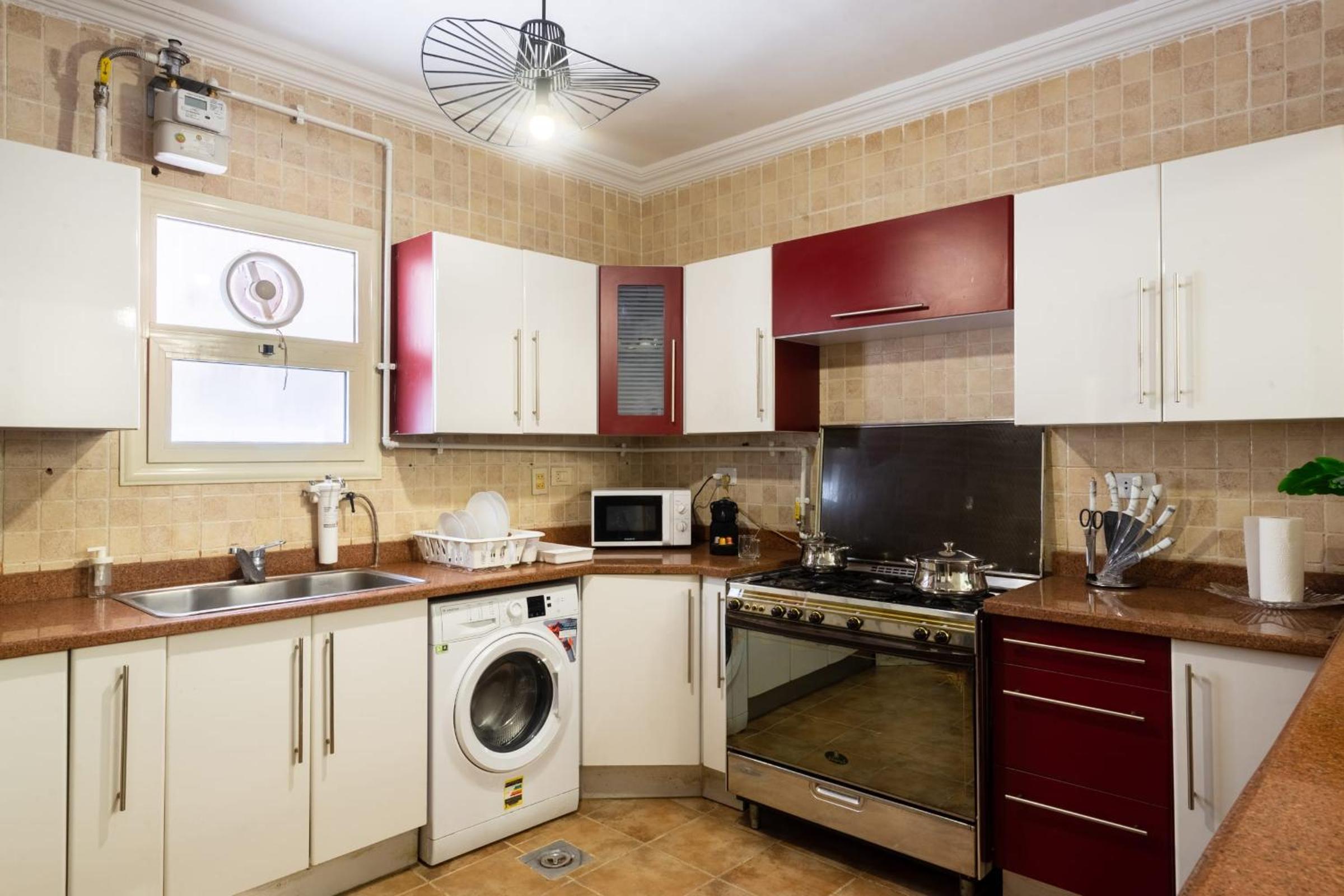 Distinct & Decent 2 BDR Apt Steps From Nightlife and Airport