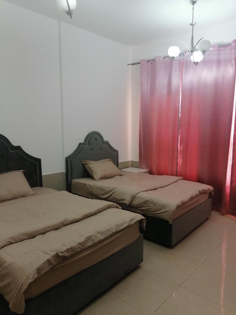 Al Qasba Lima Suites