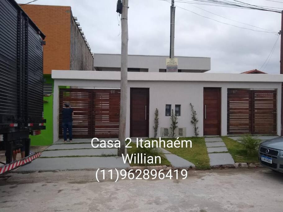 A Casa Linda Com Piscina Aquecida churrasqueira wifi pertinho da praia em Itanhaém