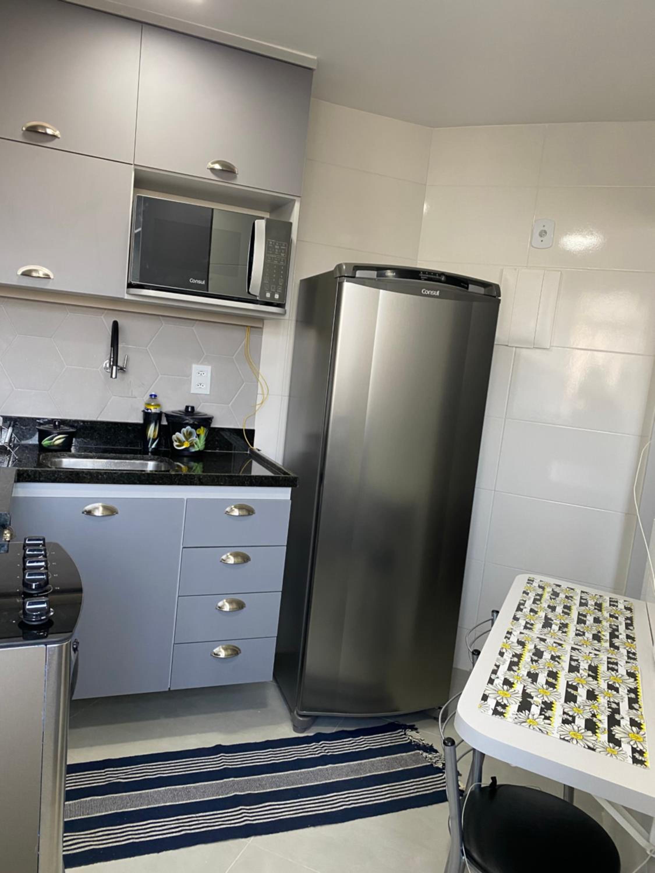 Apartamento novo ao lado do Rio Centro! view 5