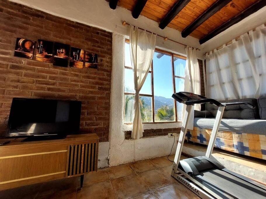 Cabaña con vista al Cerro Arco y la ciudad de Mendoza
