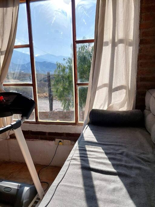 Cabaña con vista al Cerro Arco y la ciudad de Mendoza