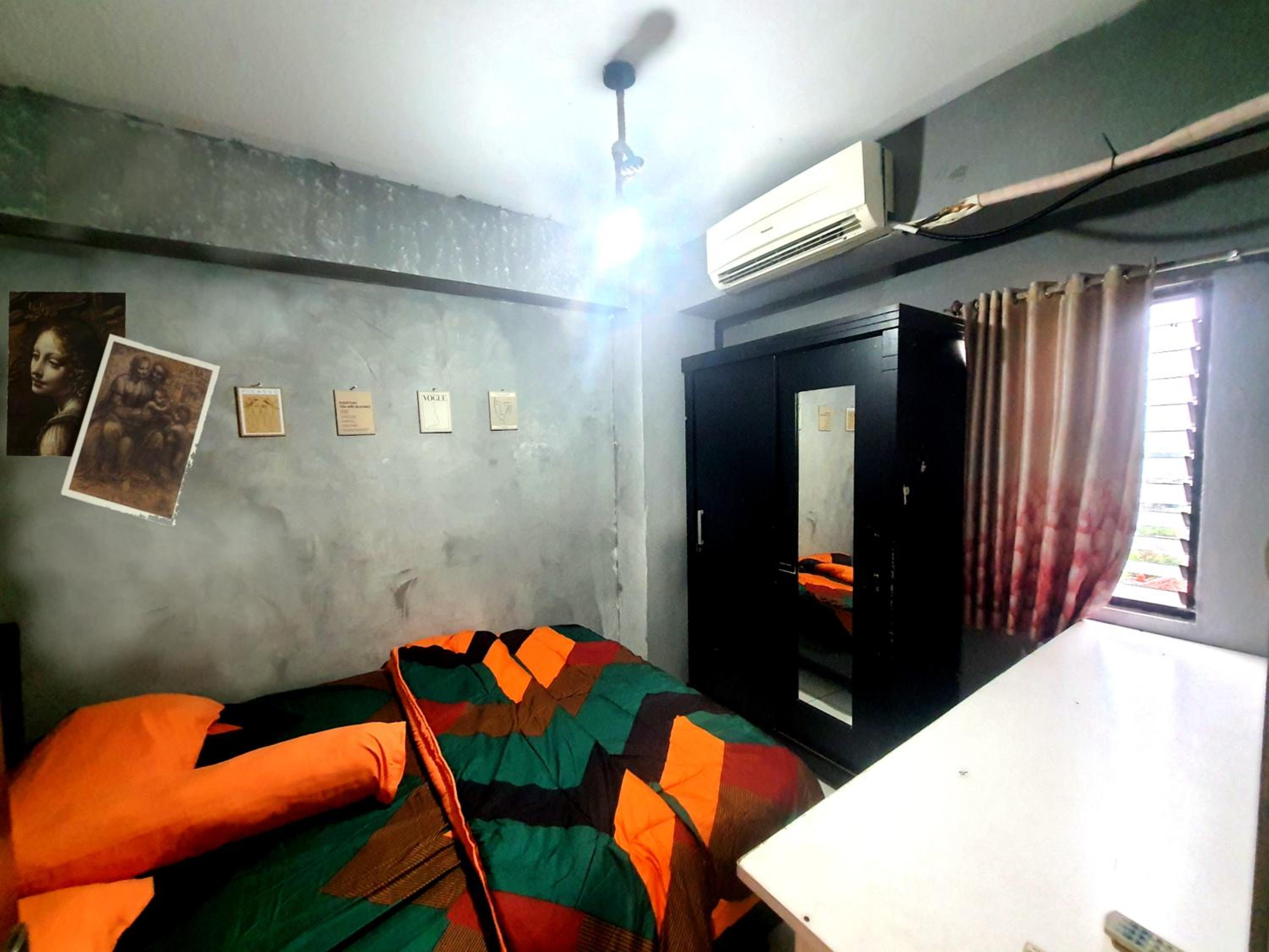 Cibubur Village Apartment by Sang Living view 3