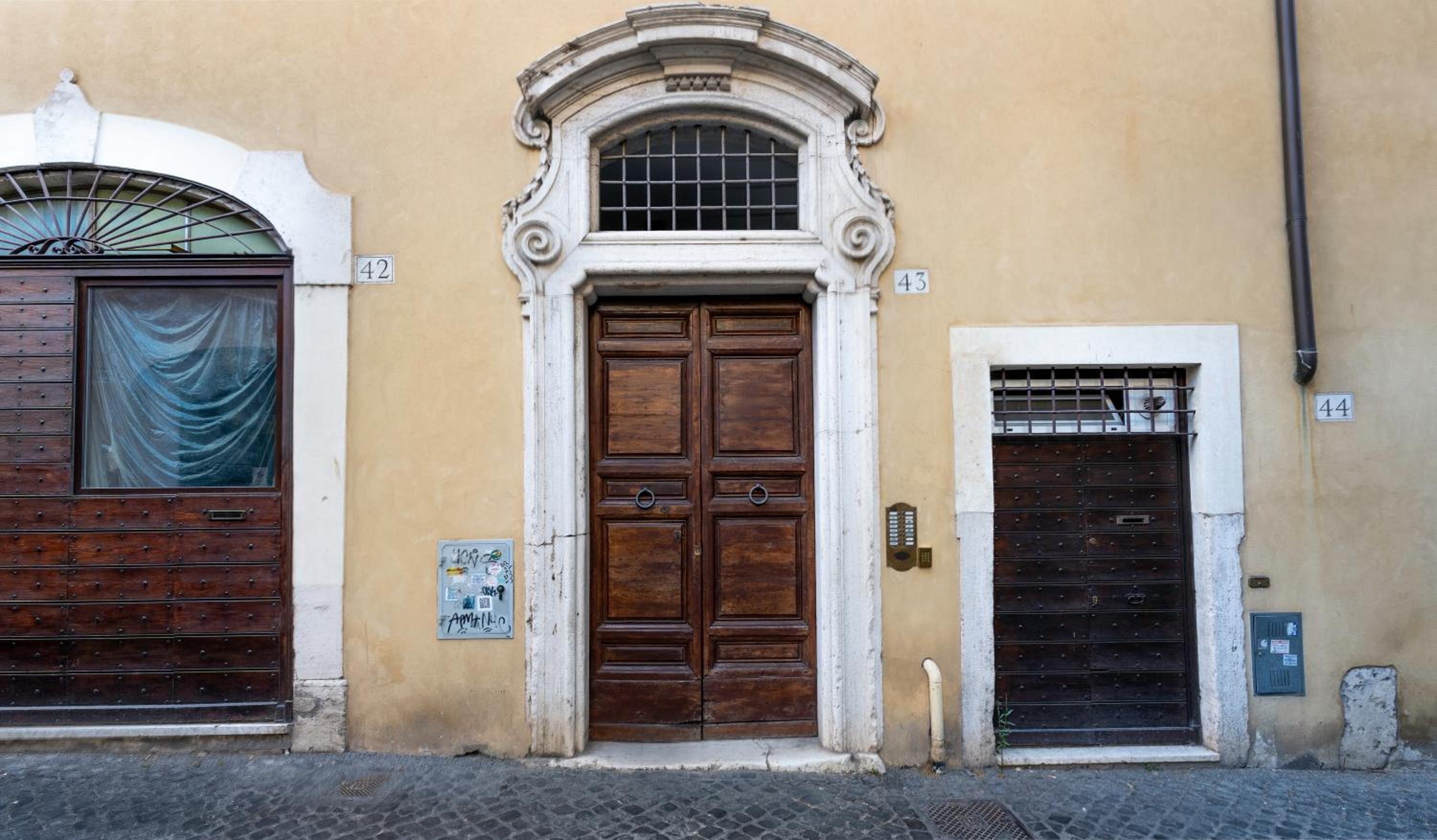 Quiet Trevi Fountain Apartment with patio and backyard