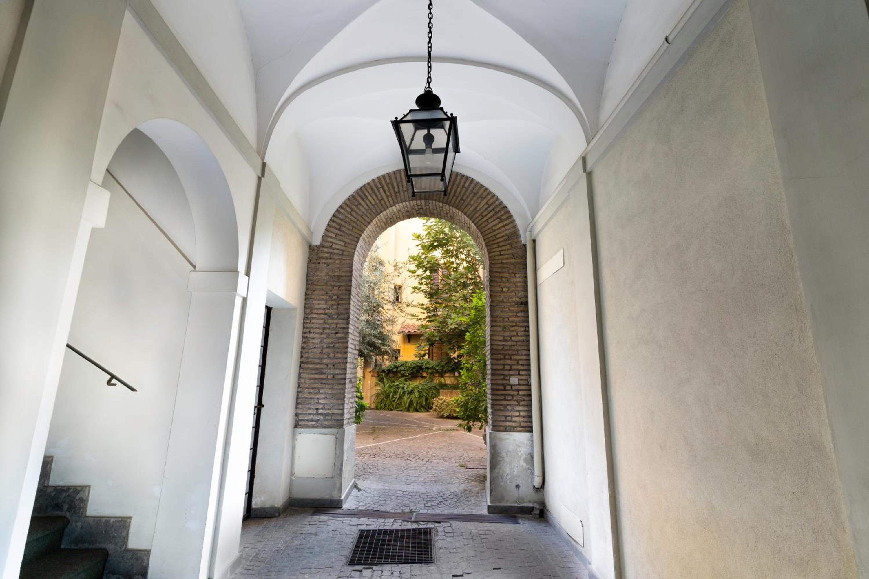 Quiet Trevi Fountain Apartment with patio and backyard