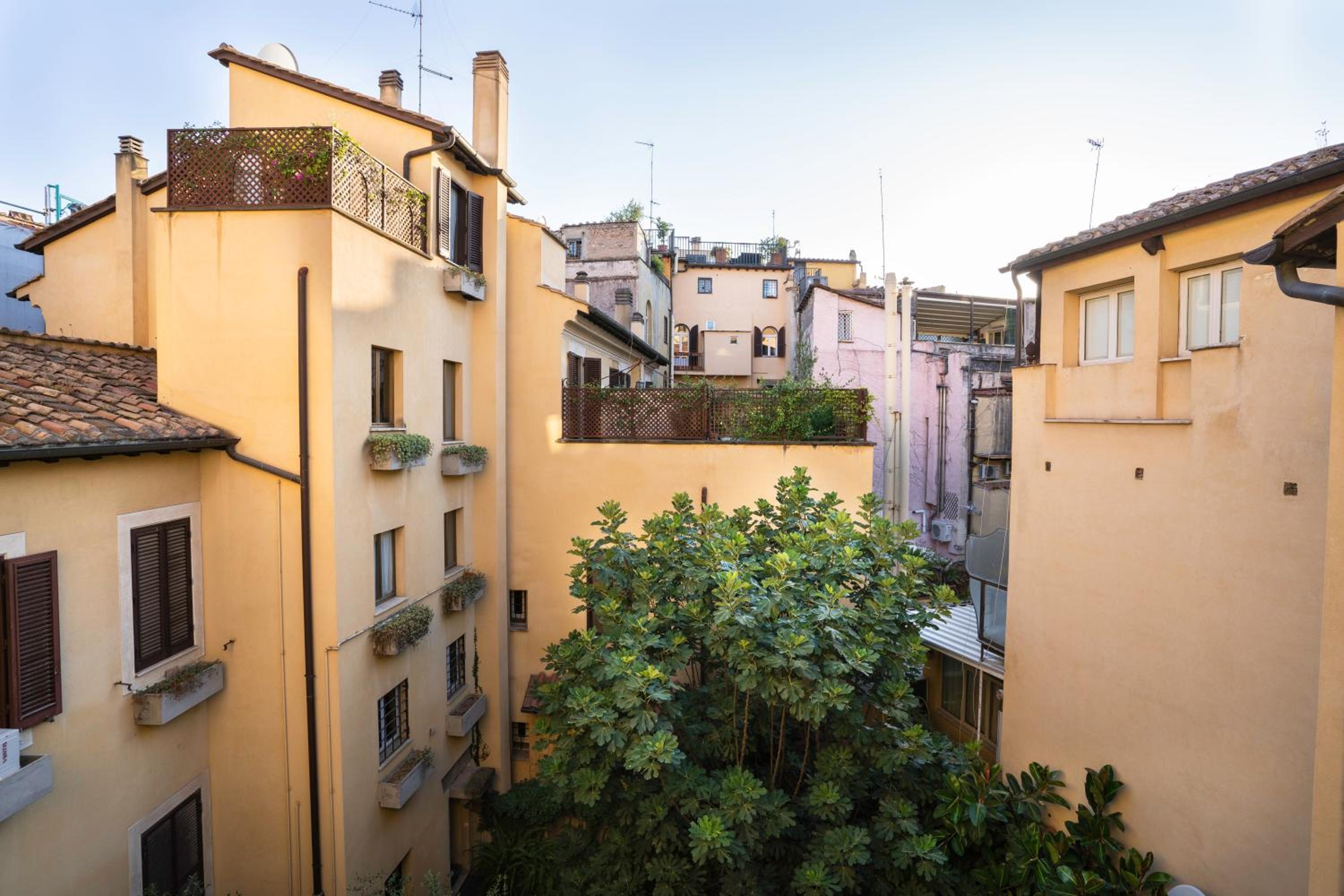 Quiet Trevi Fountain Apartment with patio and backyard