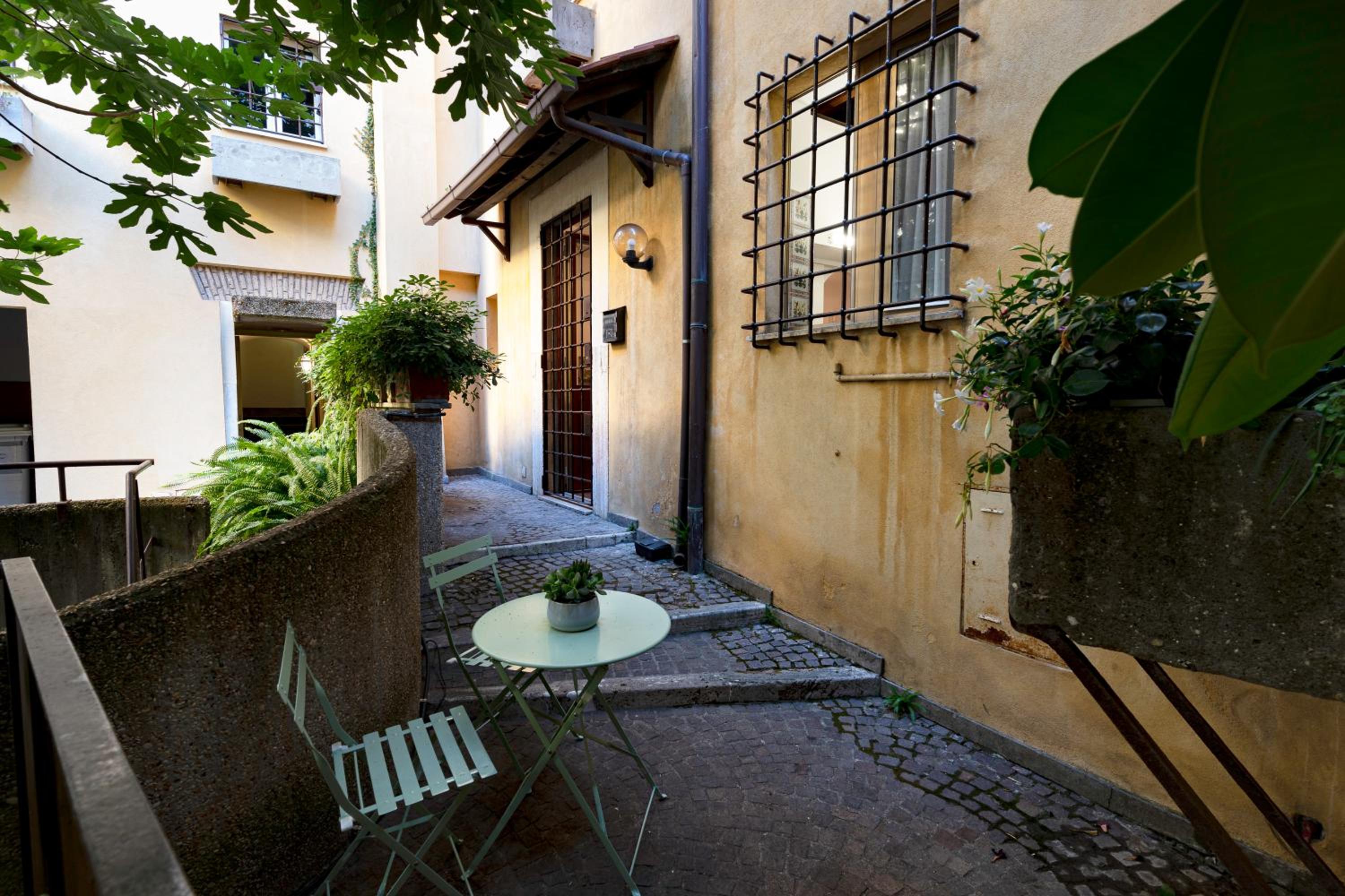 Quiet Trevi Fountain Apartment with patio and backyard