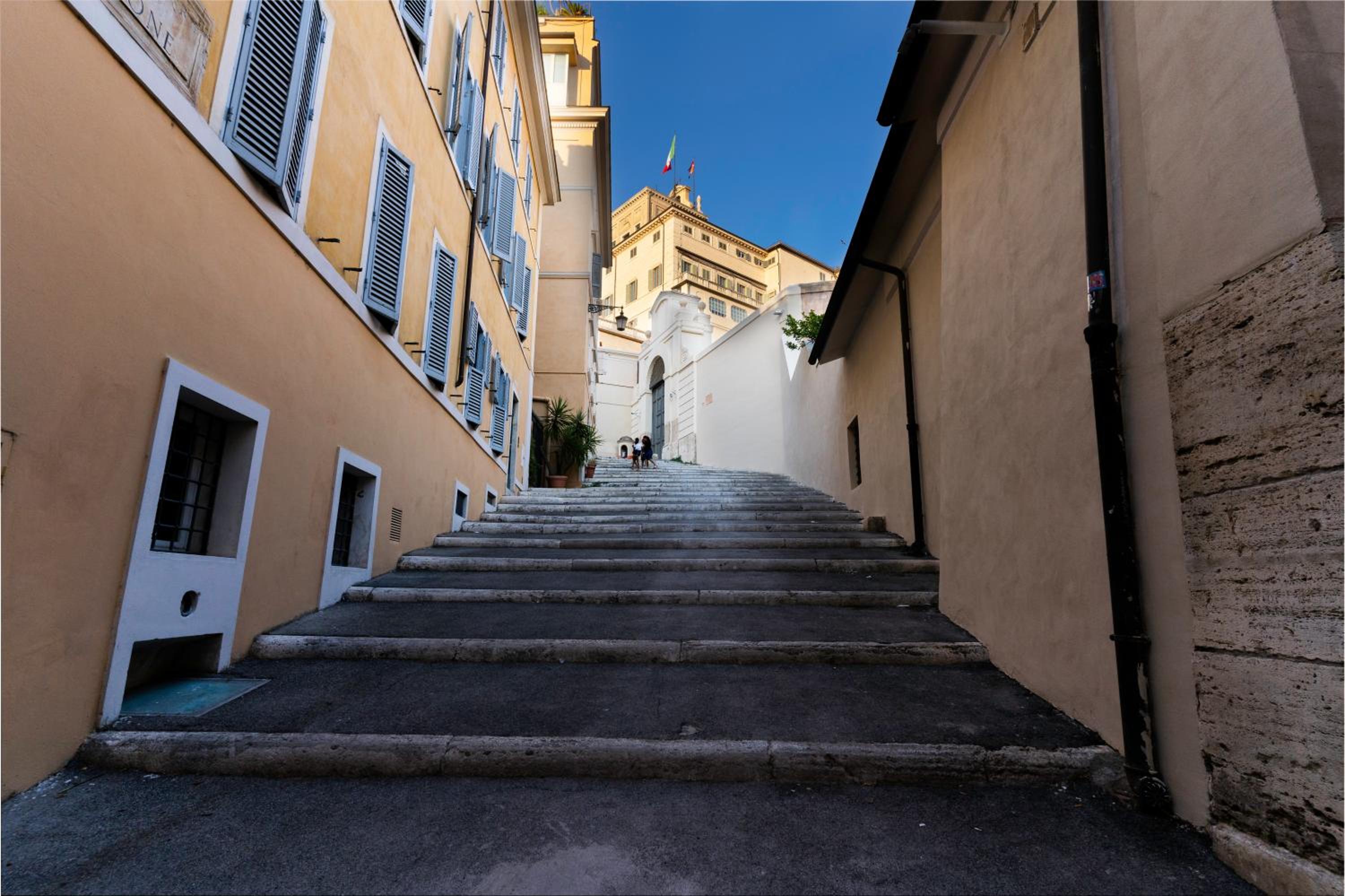 Quiet Trevi Fountain Apartment with patio and backyard