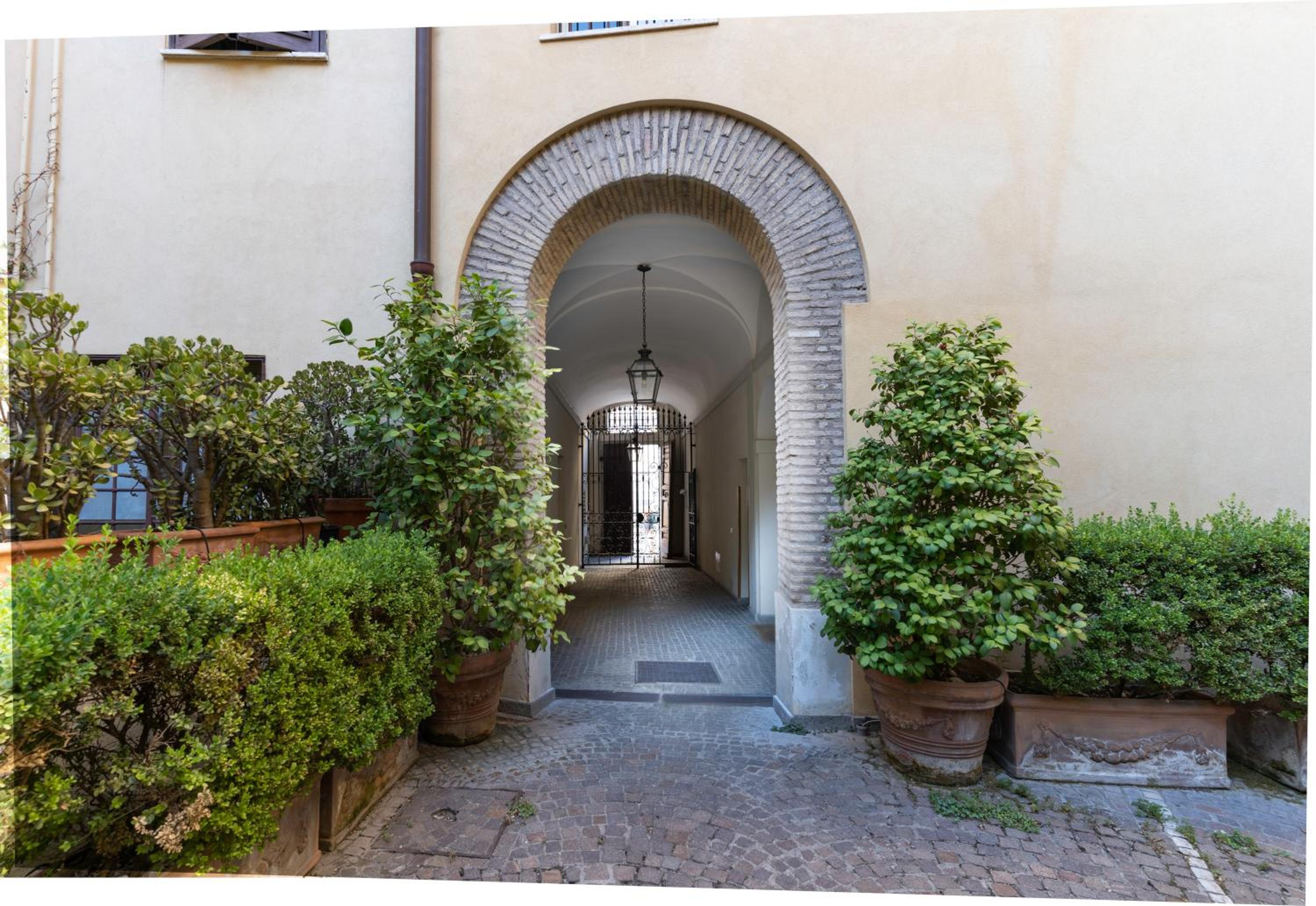 Quiet Trevi Fountain Apartment with patio and backyard