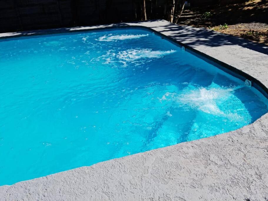 Agradable casa con Tina de agua Caliente y Piscina