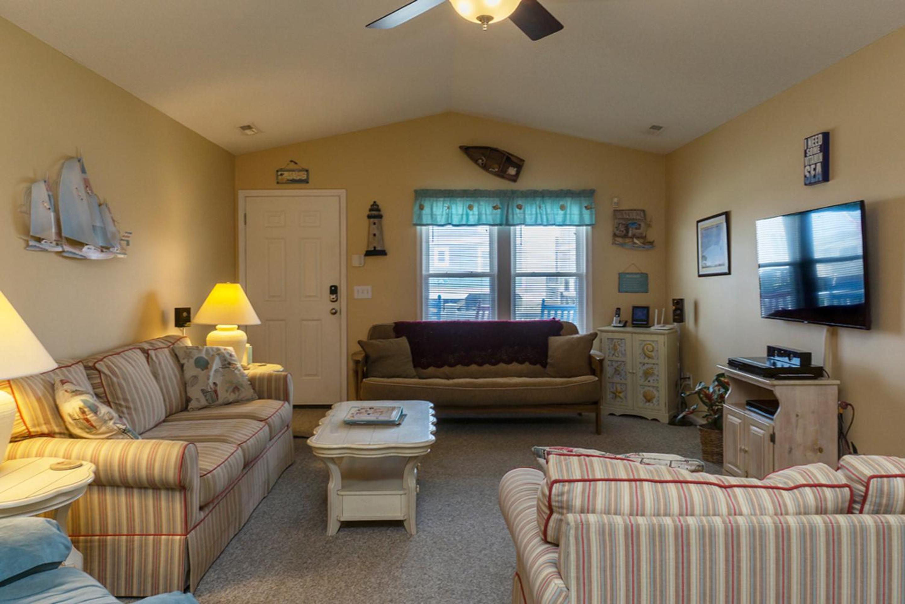 Shore Beats Work by Oak Island Accommodations view 2