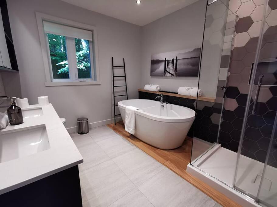 Chalet de luxe Équinoxe - bord de l'eau avec Spa