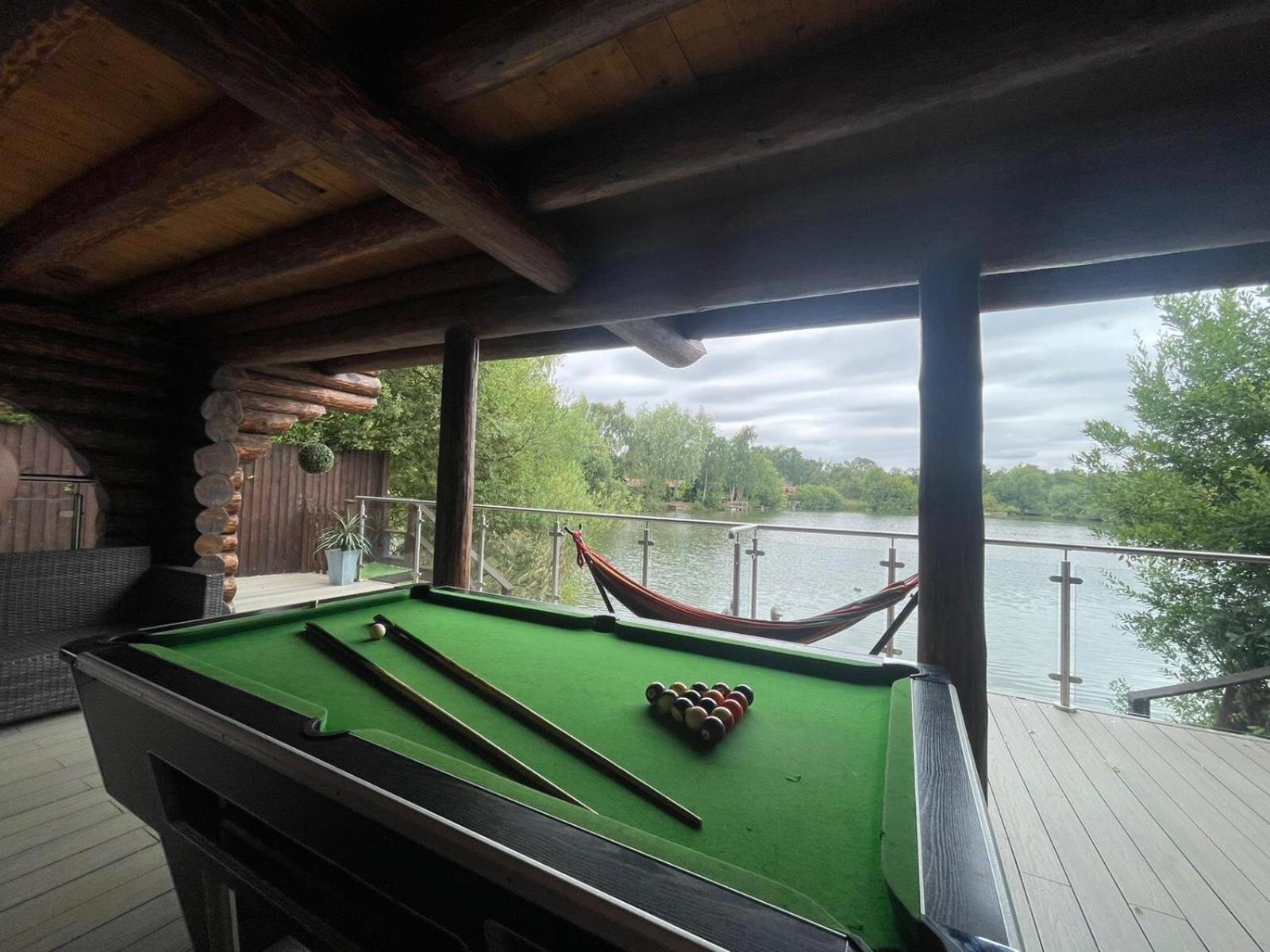Woodpecker Log Cabin with hot tub, pizza oven bbq entertainment area, lakeside with private fishing peg situated at Tattershall Lakes view 4