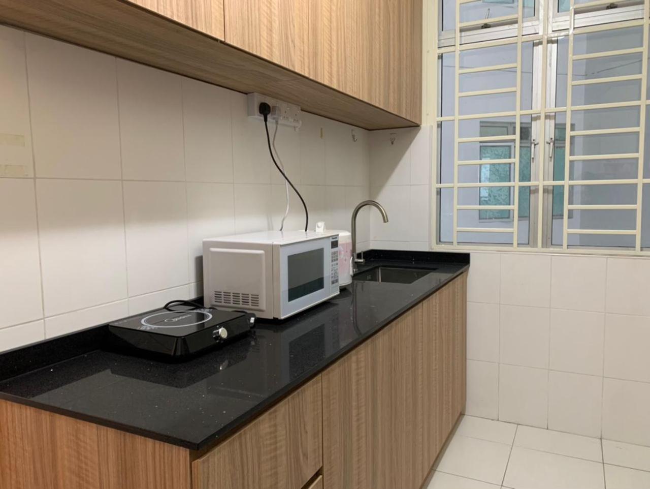 Tebrau City Residence,Warm Suite by Antlerzone