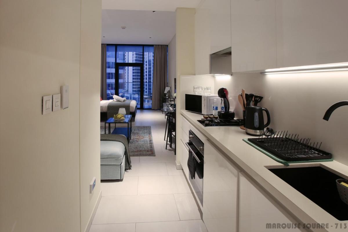 Luxury Studios with Burj Khalifa & Canal View in Downtown - Marquise Square Tower
