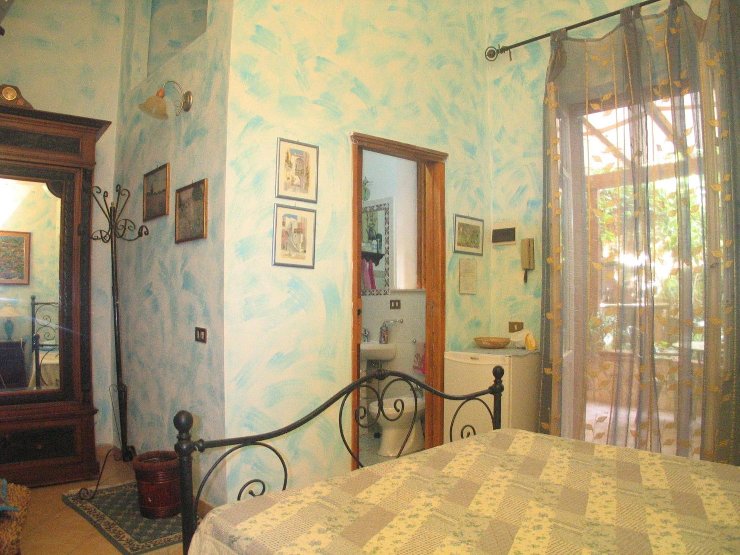 The Garden en Sferracavallo — hotel room